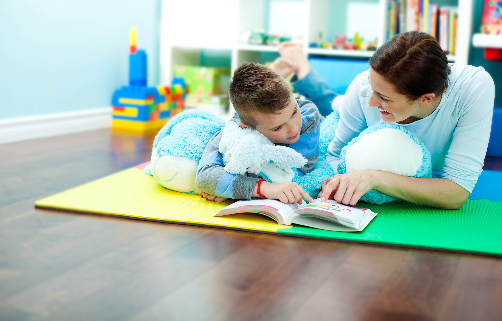 mother and son reading a book