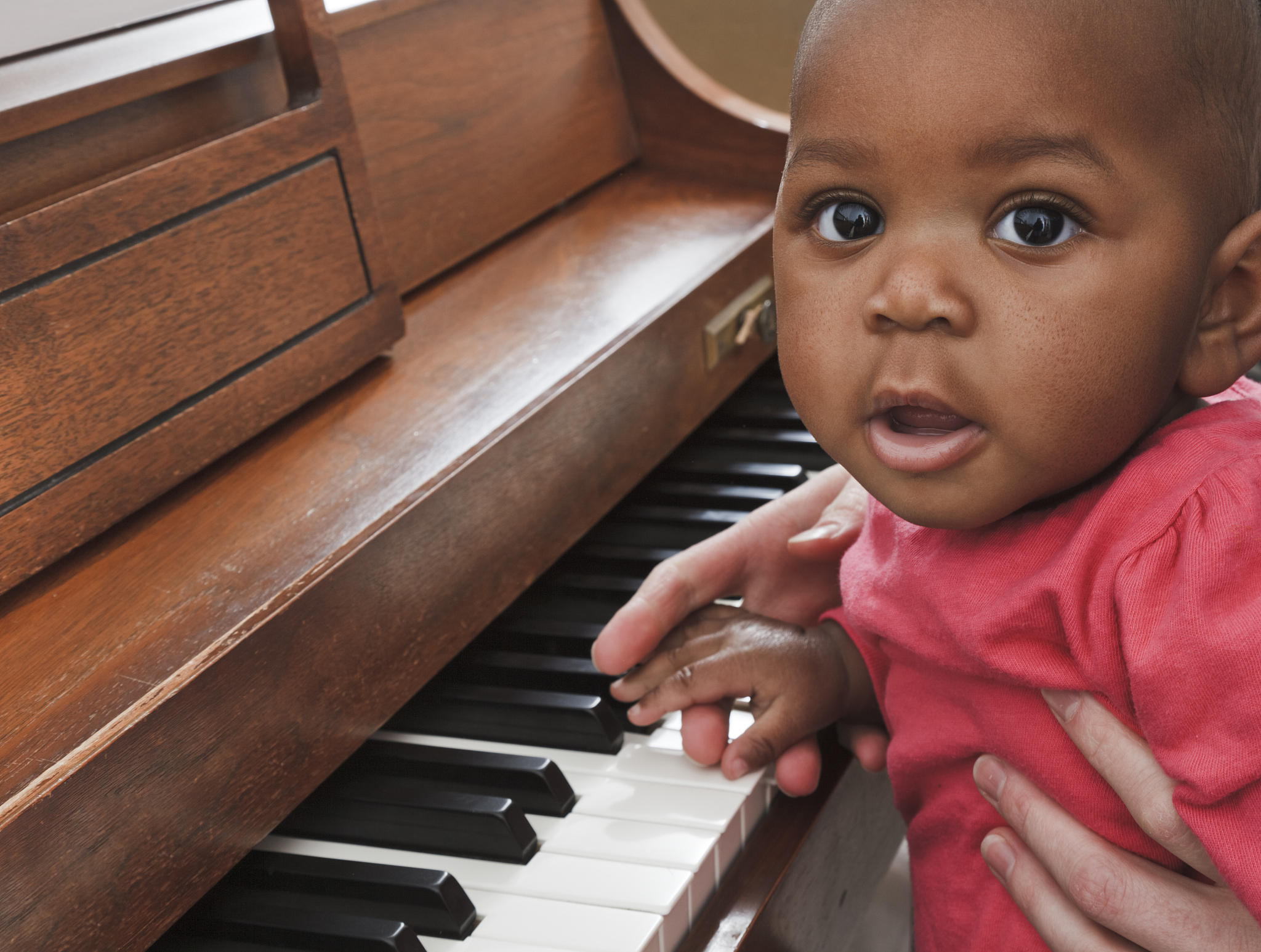 mother, adopted baby african descent multi-ethnic daughter playi
