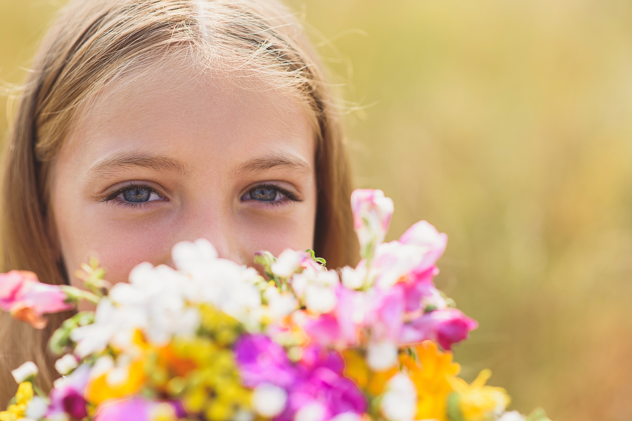 cute female child with field bouquet