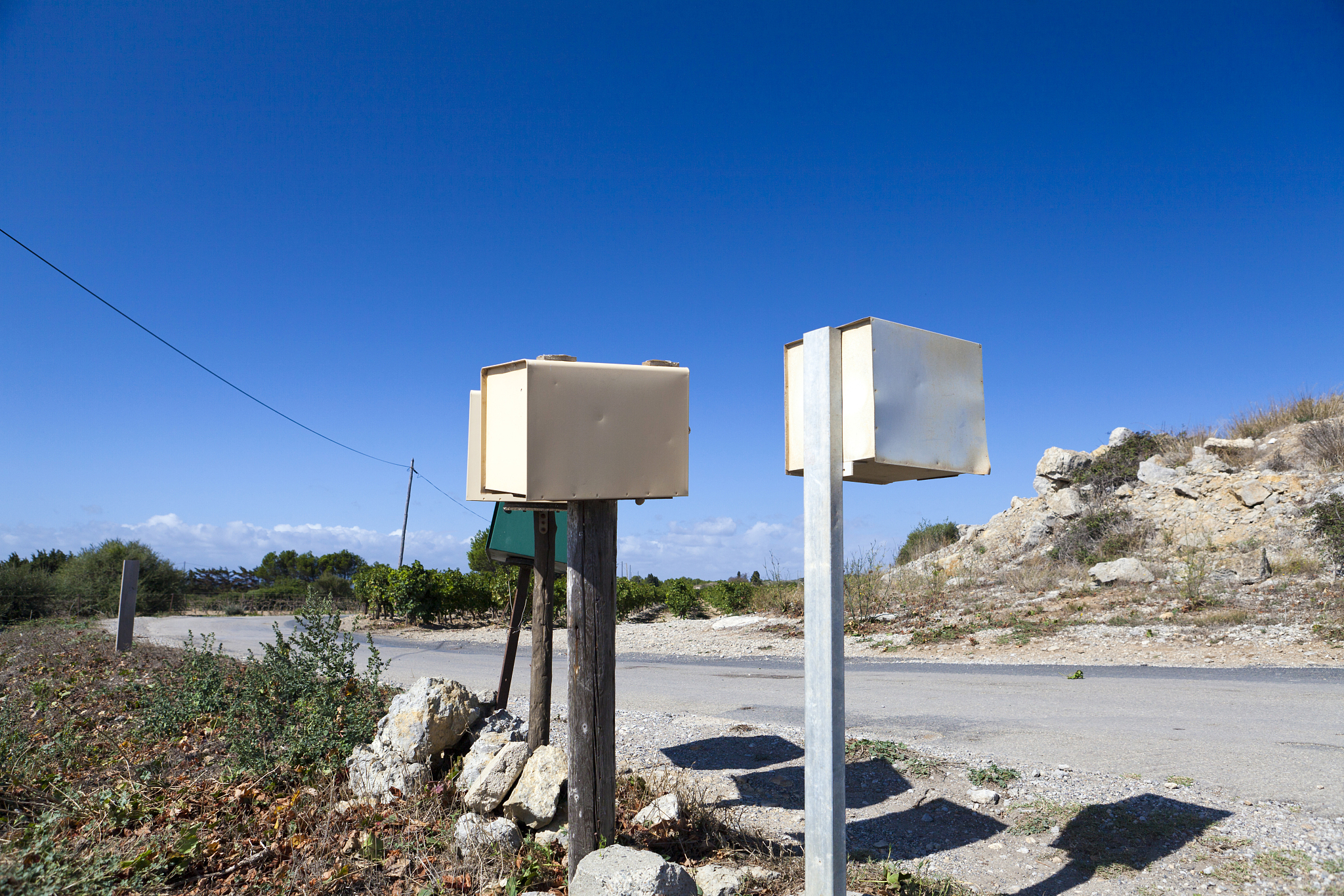 some mail boxes on roadside