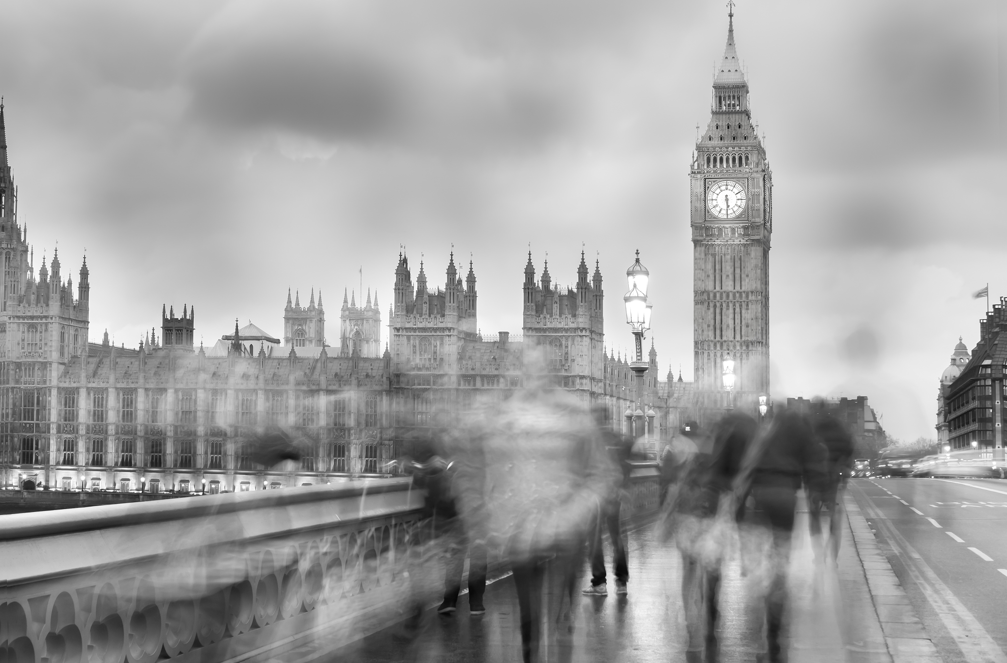 blurred motion of people walking on westminster bridge