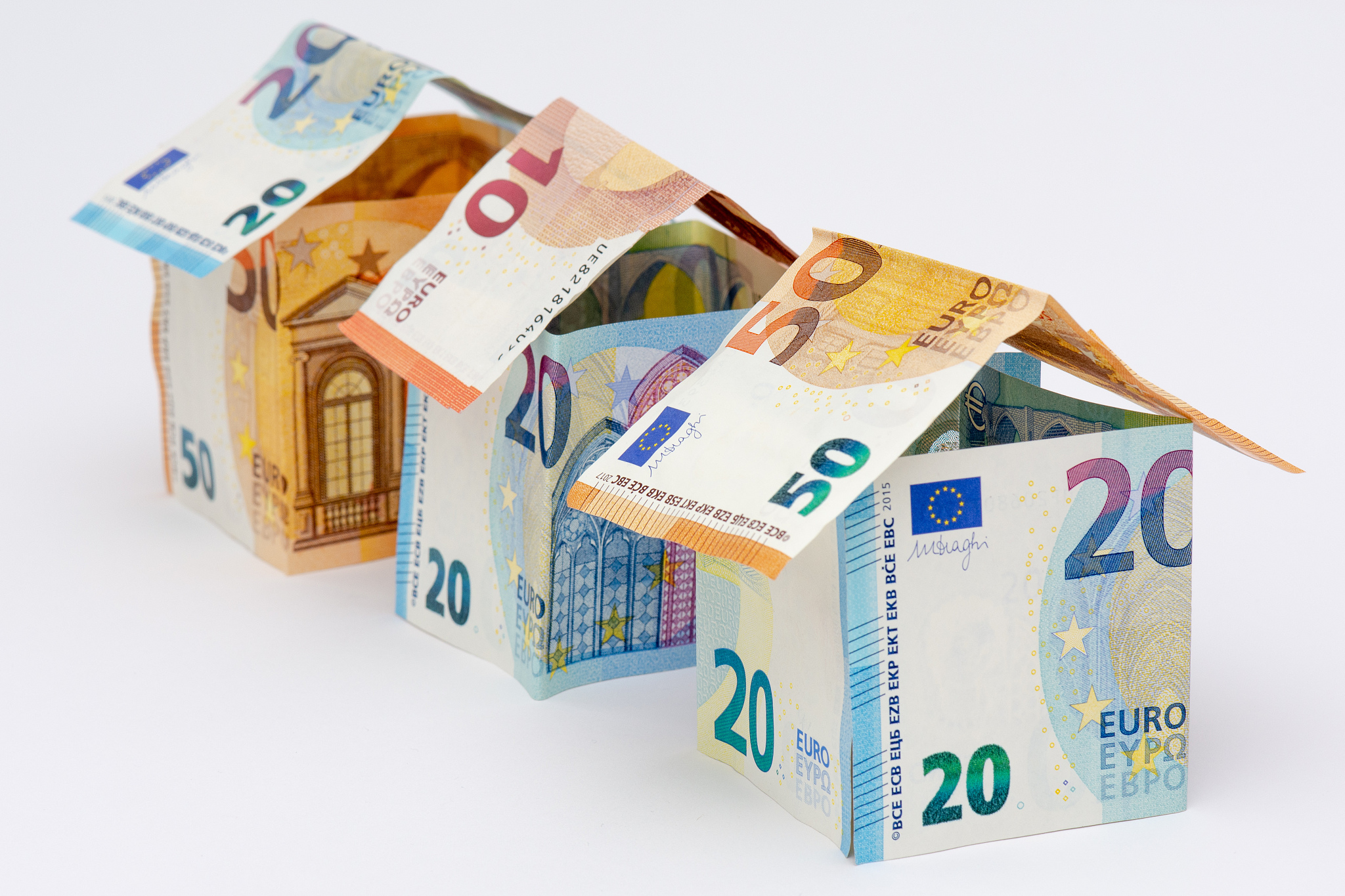 houses made of euro banknotes