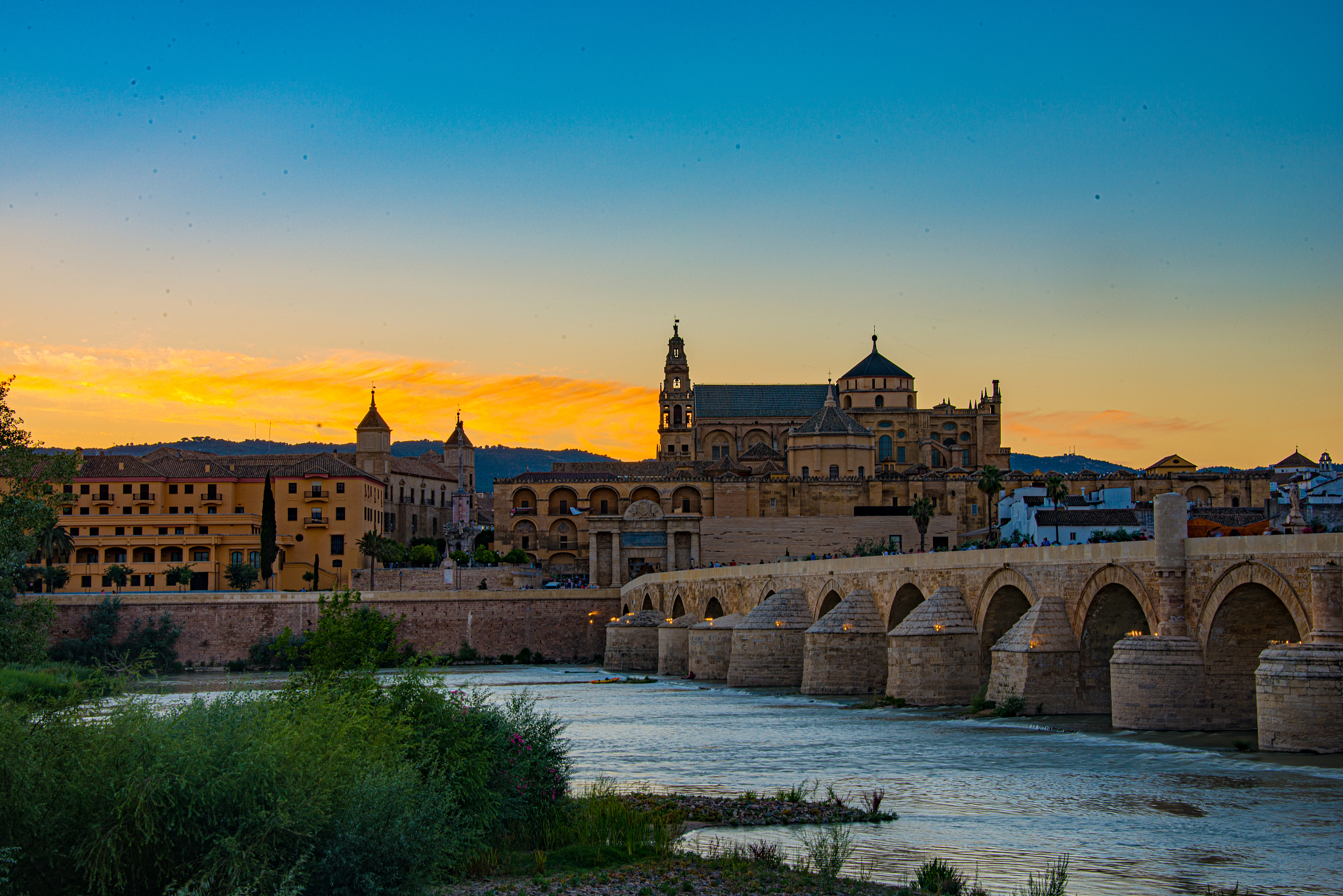 mosque-cathedral and roman bridge of cordoba, andalusia, spain