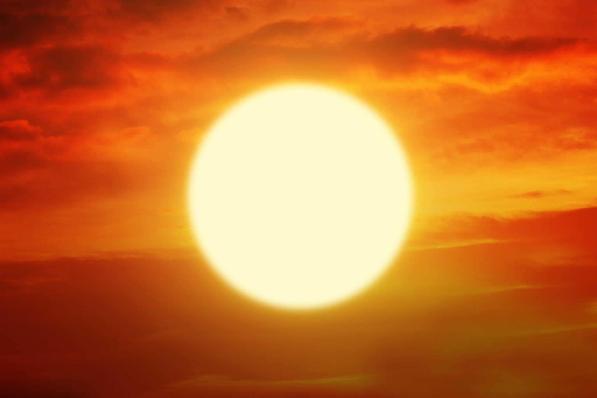 beautiful sunset with golden sun and orange sky