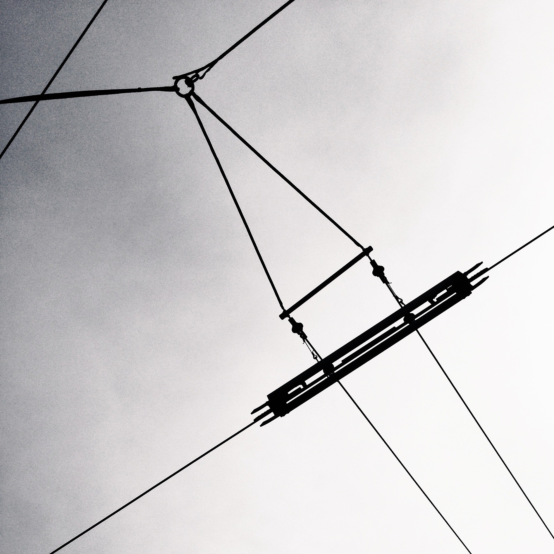 low angle view o<strong>f</strong> electricity cables against sky