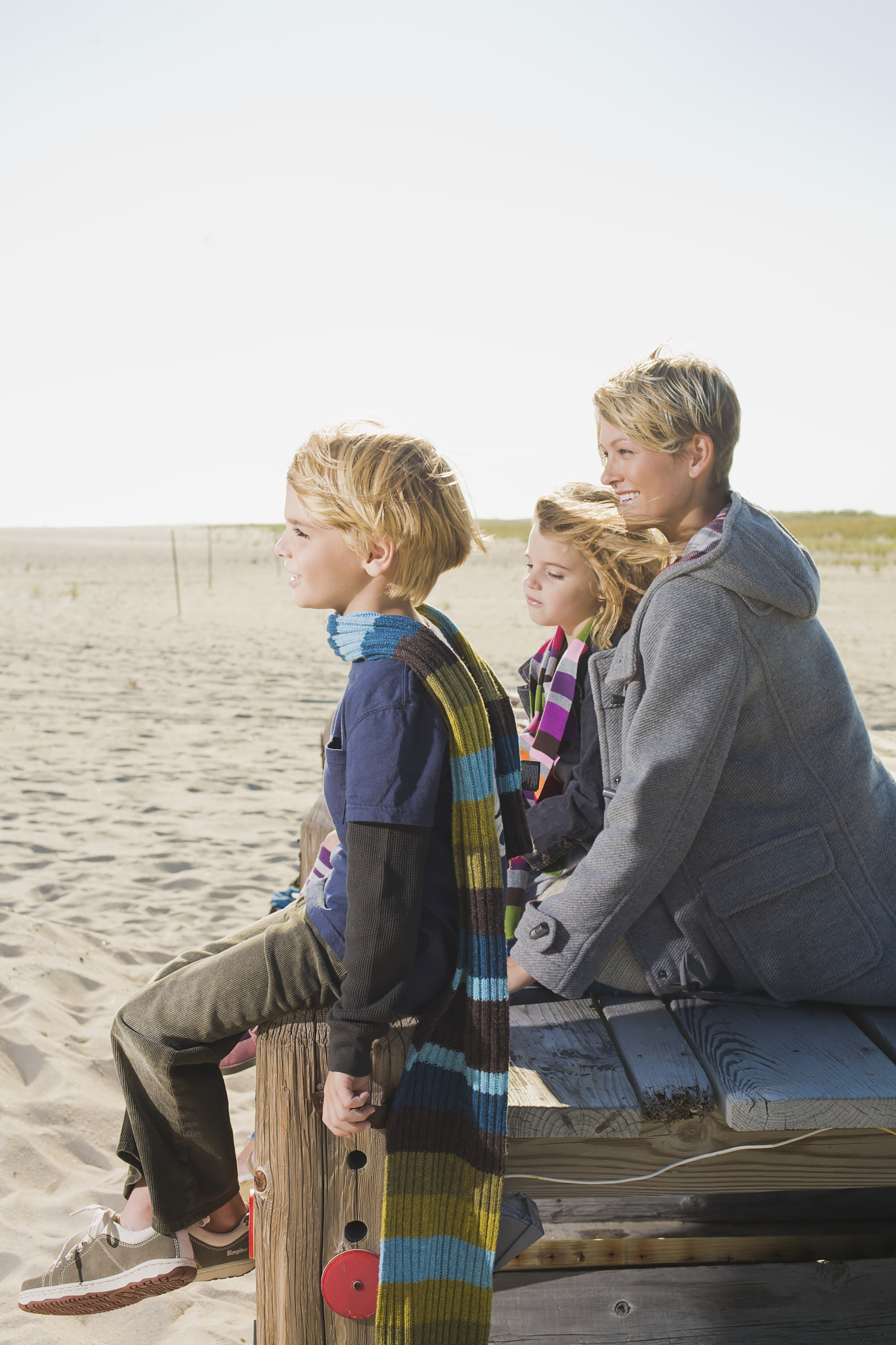 mother and children on beach