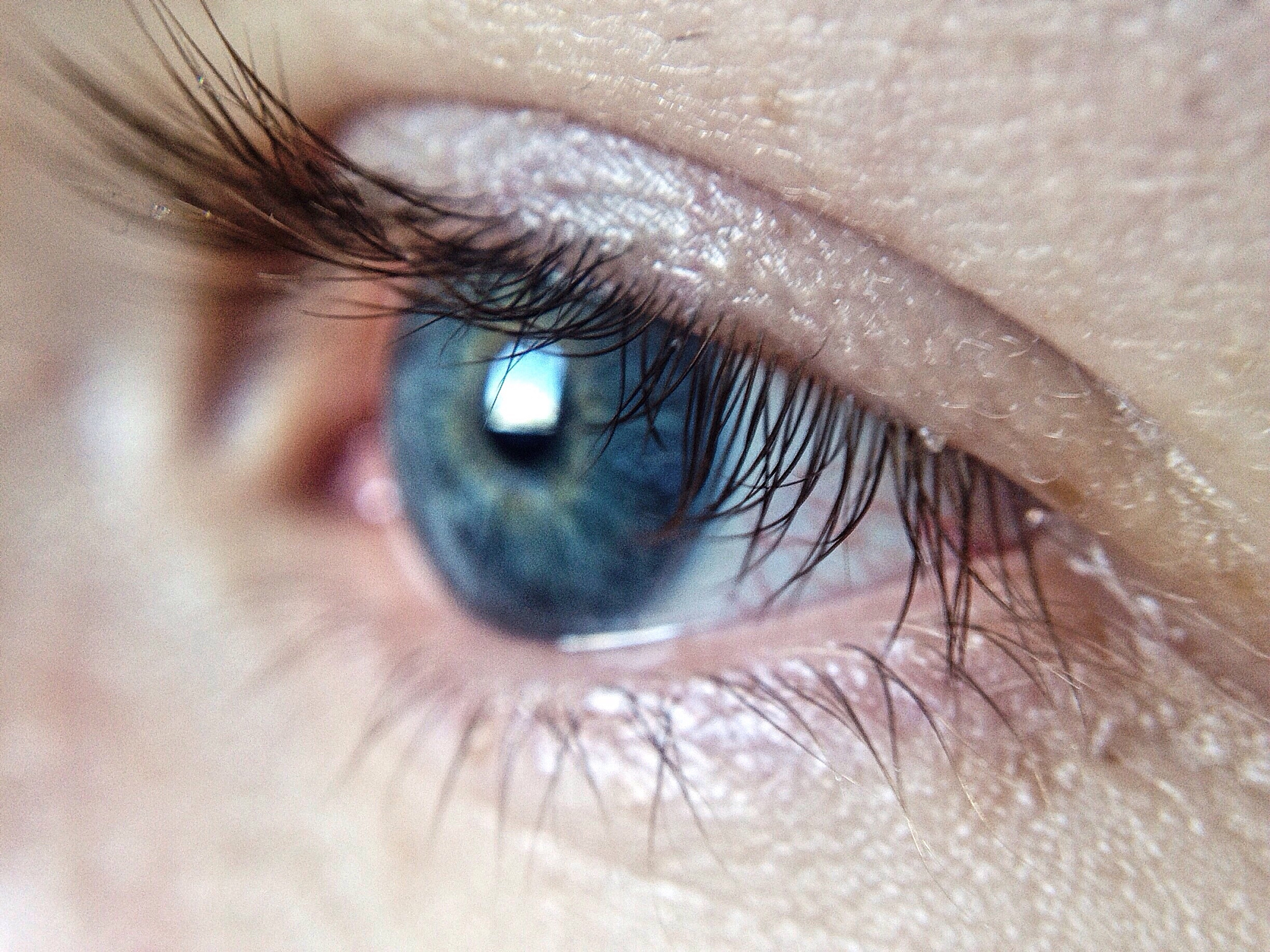 close-up of blue eyed woman