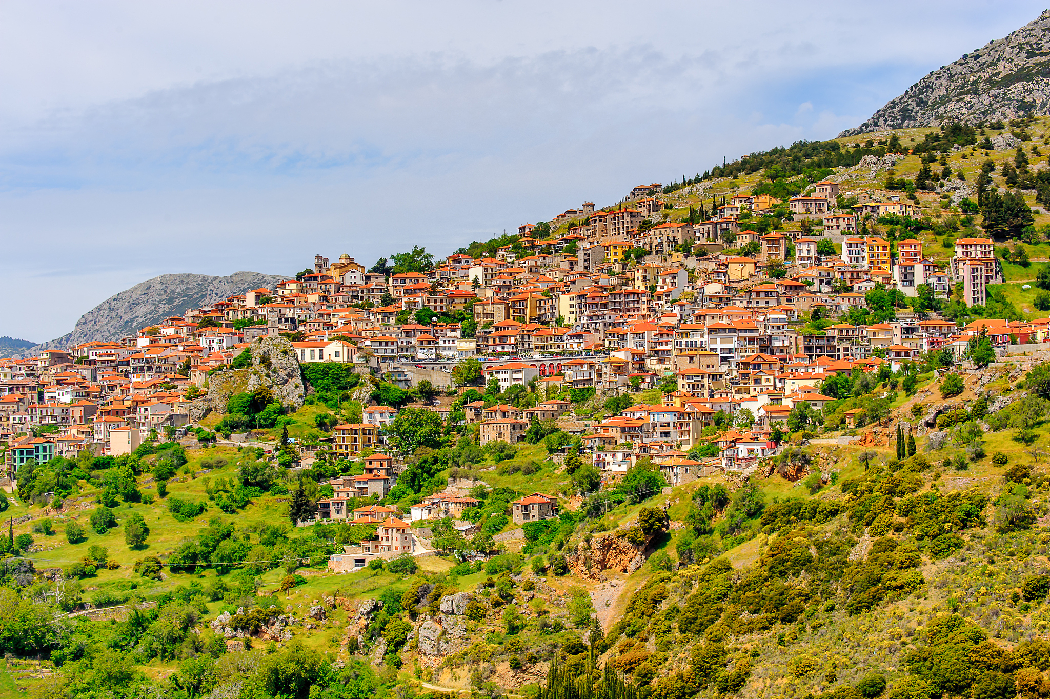 pamoramic view of arachova, greece.  a village on the green slop