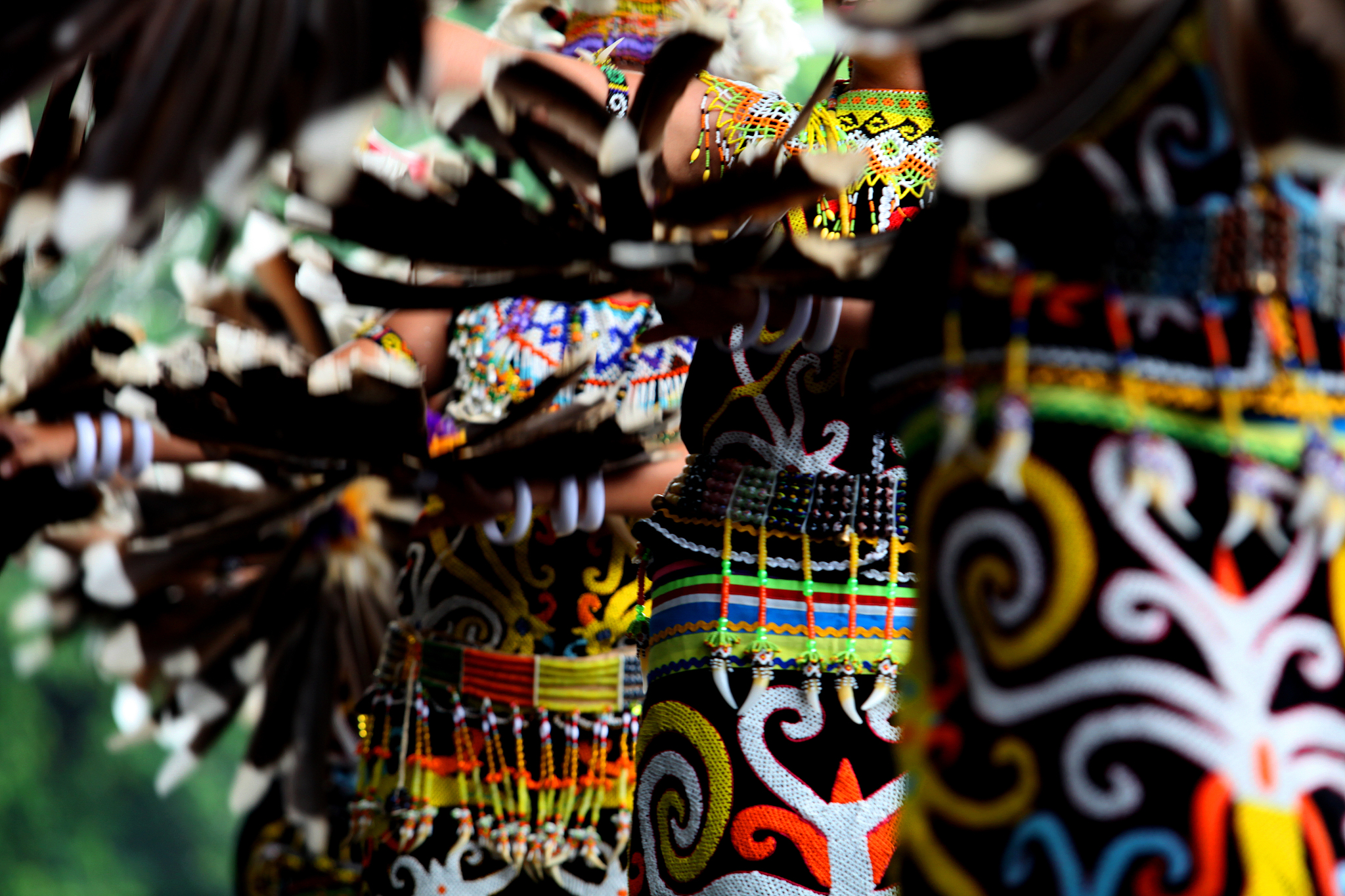 midsection of people wearing traditional clothing