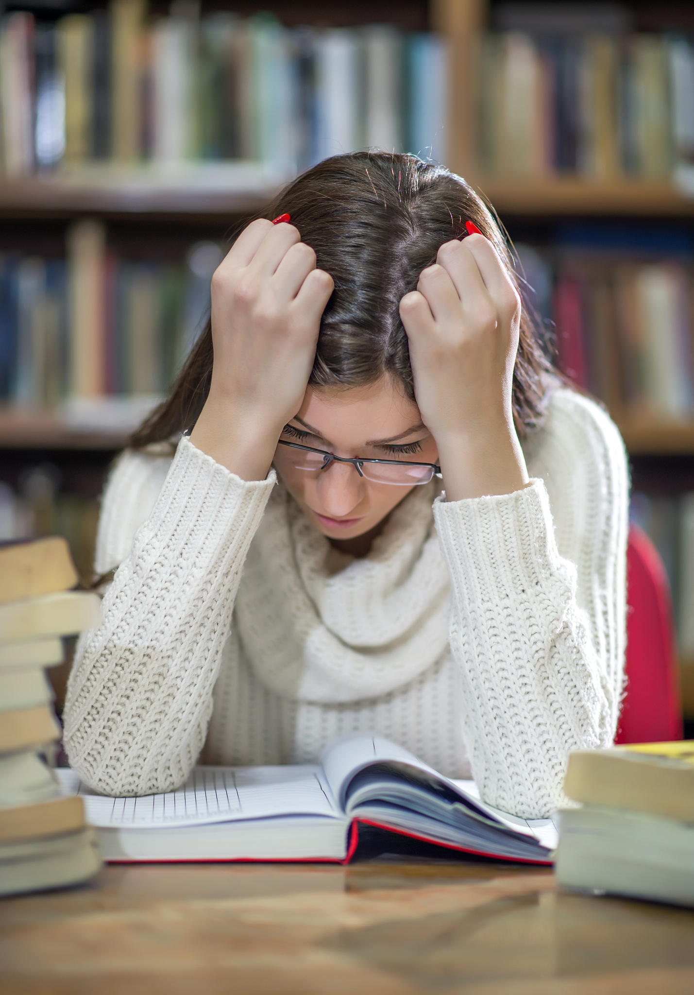 female college student in a library