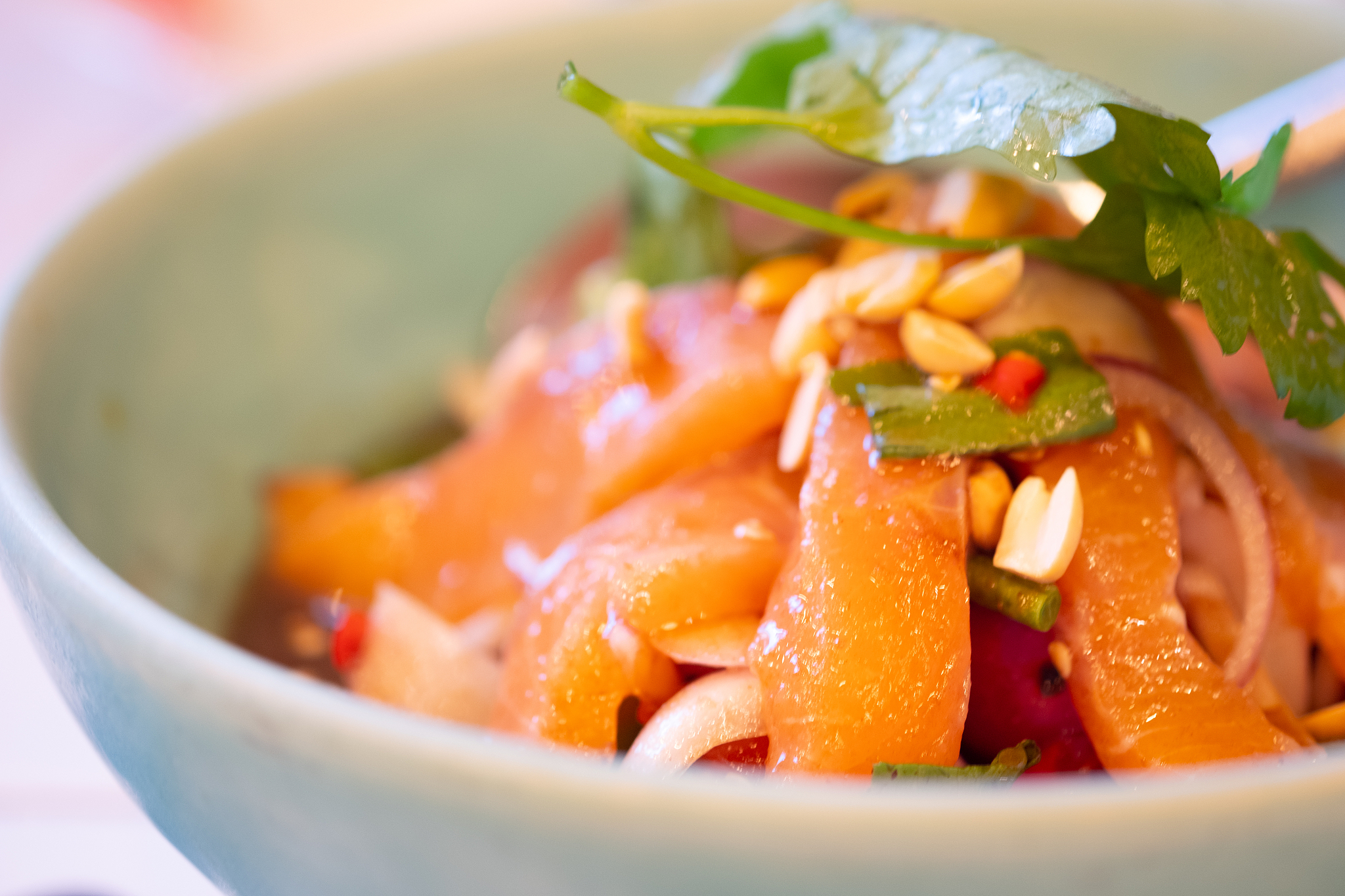 spicy salmon salad, traditional of freshly prepared thai food. h