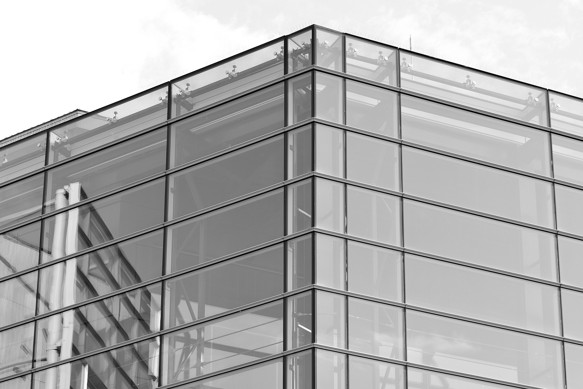 modern office building wall made of steel and glass. black and w