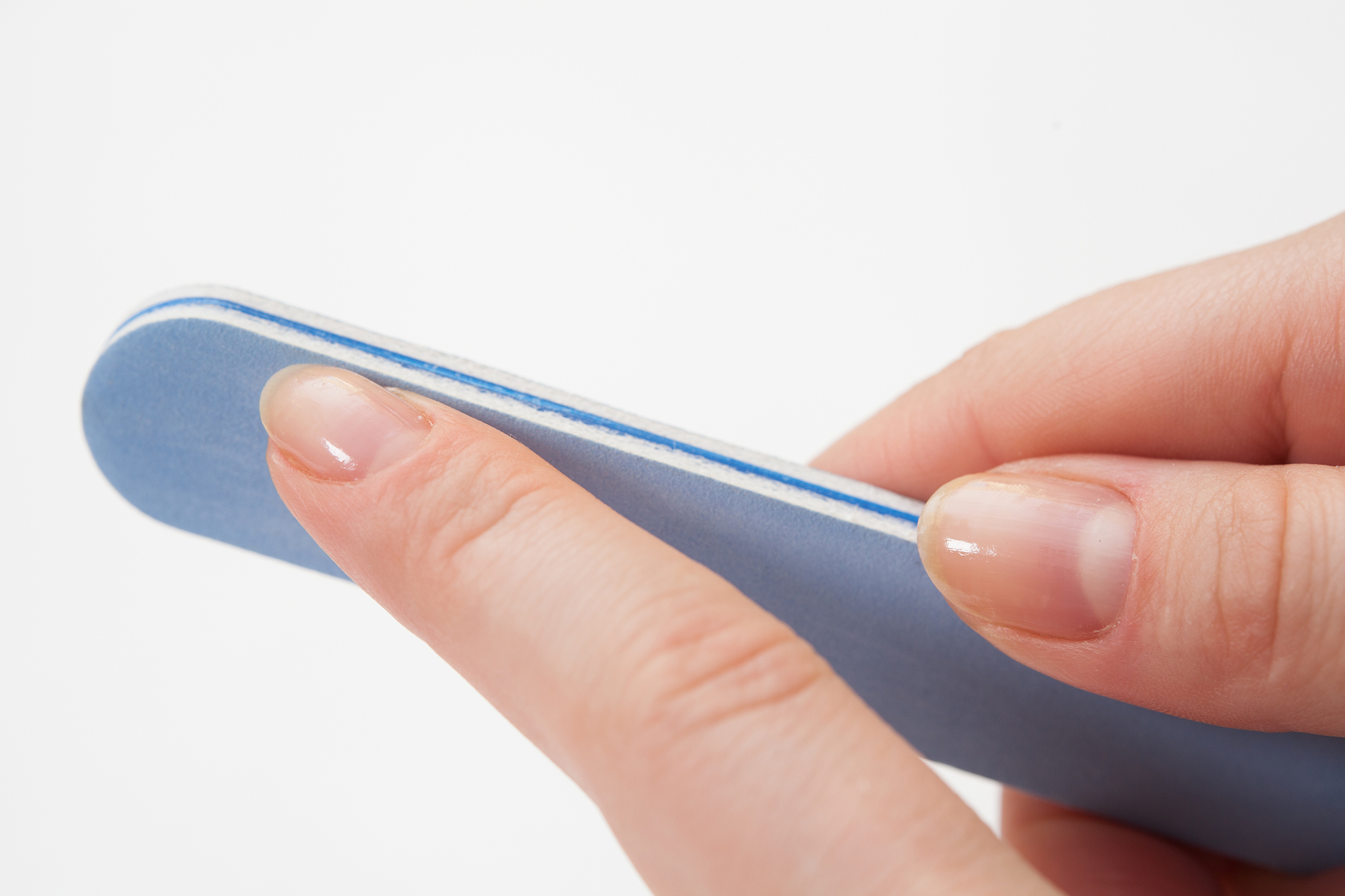 female hand and file