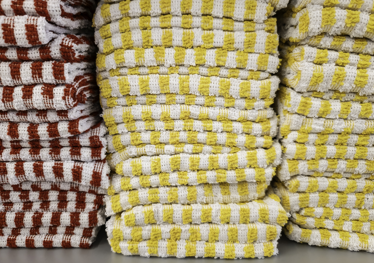 你是一名纺织爱好者请你用英语翻译一下以下文字。Fibers are spun into yarns that are woven or knitted to produce fabrics The natural fibers are cotton wool silk linen and hair fibers like cashmere and camel’s hair Traditionall