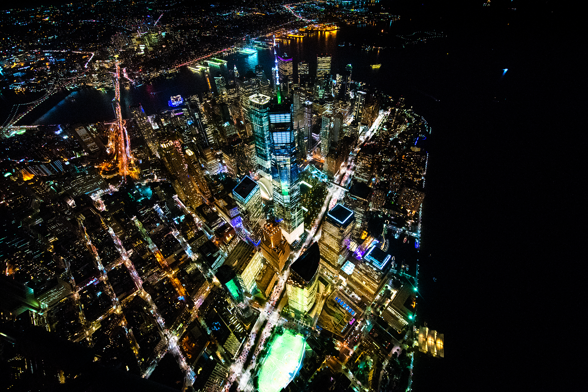 helicopter nighttime view of the one world trade center standing