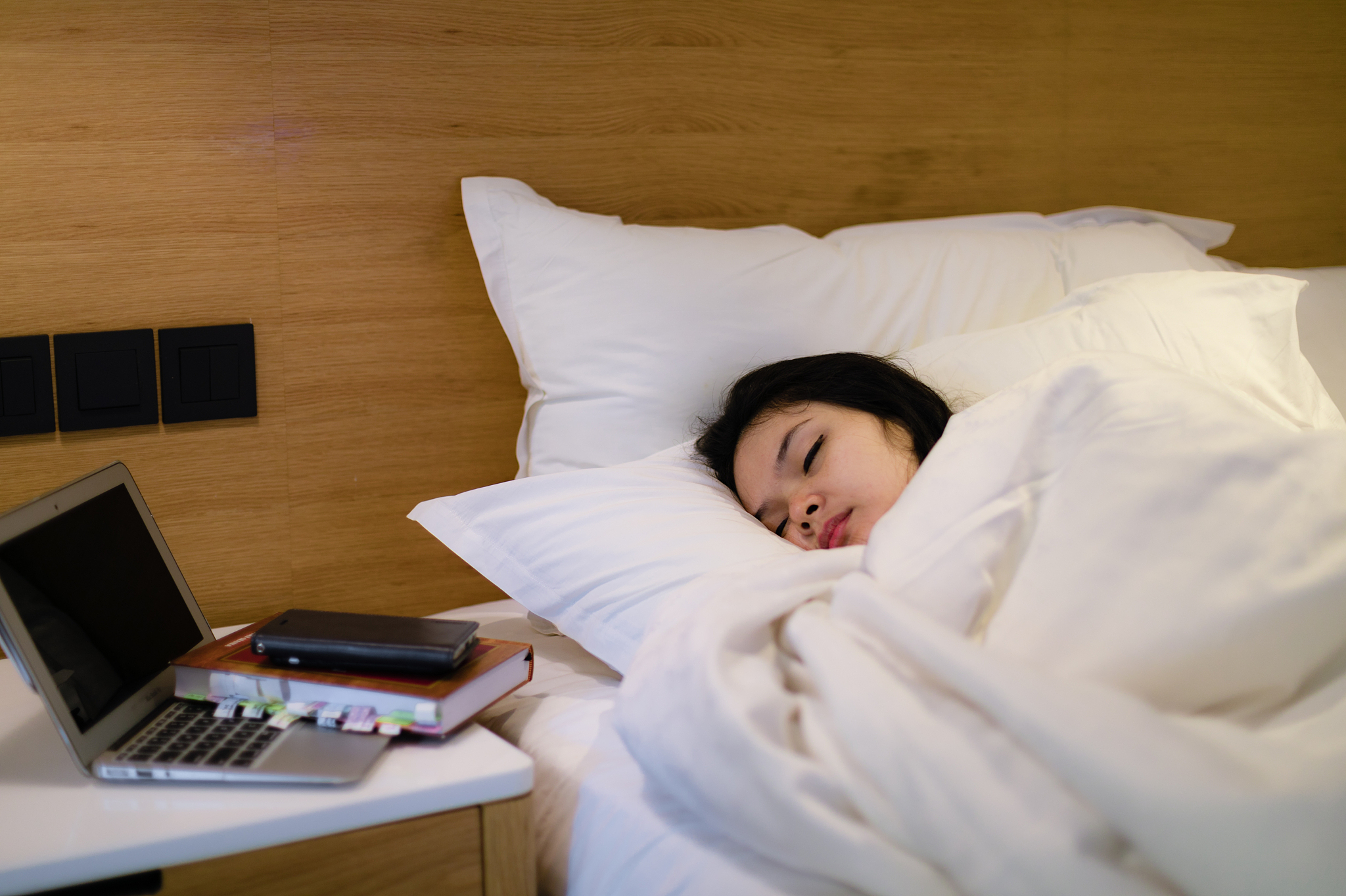 asian young woman sleeping at home