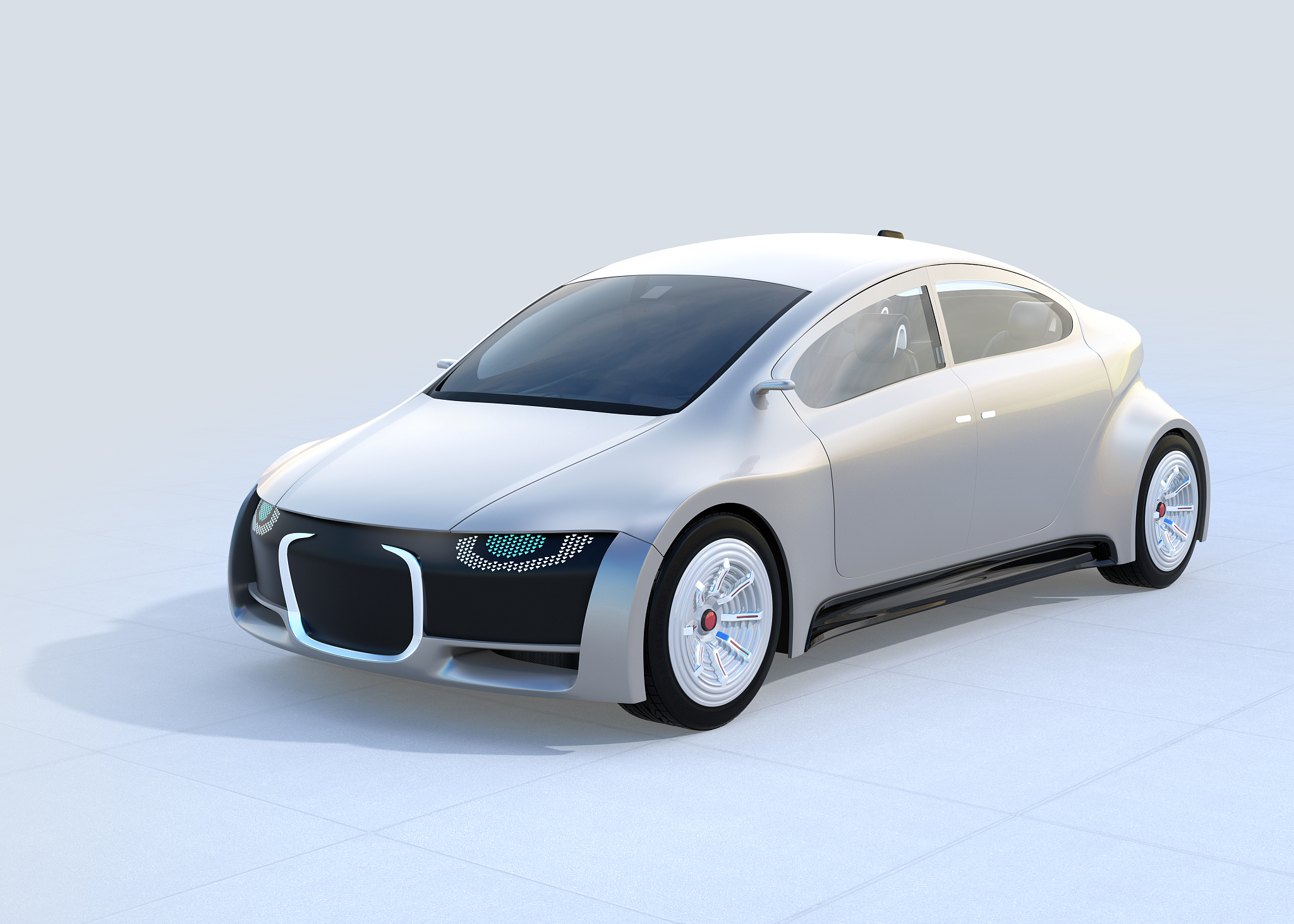 silver self-driving car parking on the ground