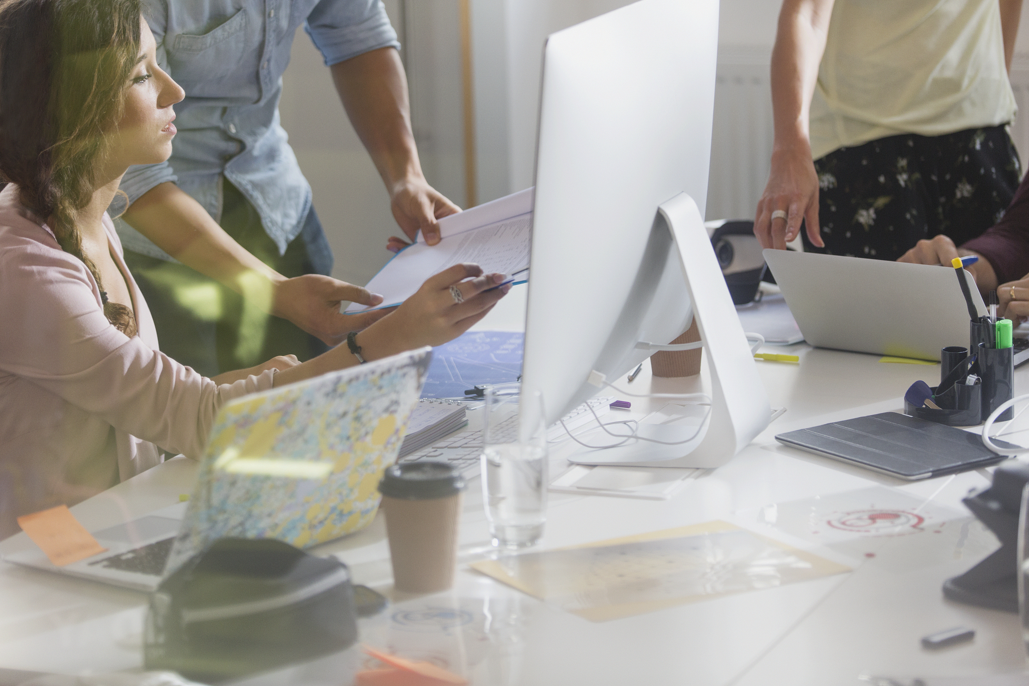 designers meeting, working at computer