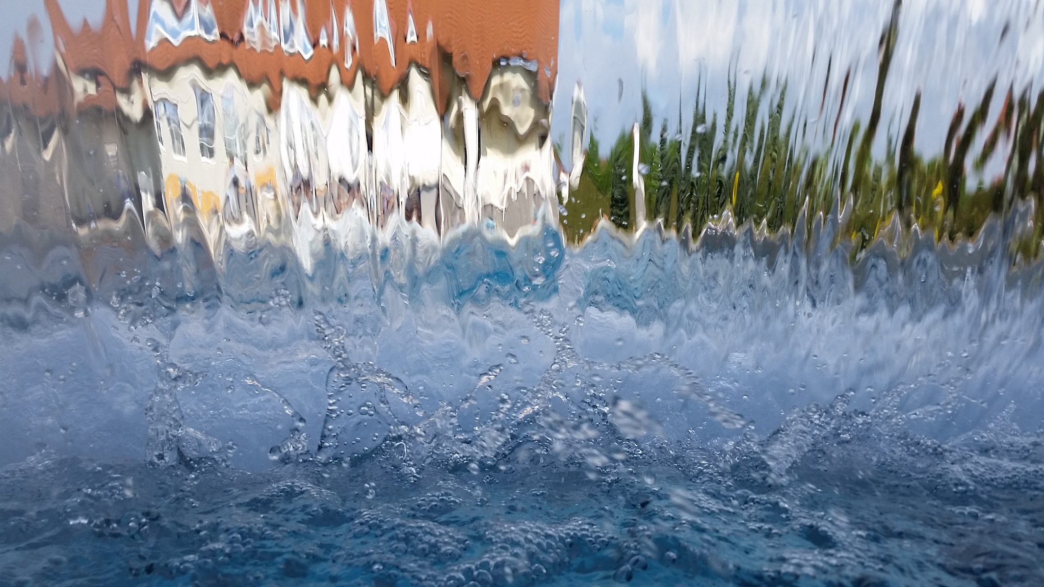 请优化这句话：It becomes crucial to examine the long-term advantages of water-efficient irrigation for winter wheat and its response to varying weather conditions