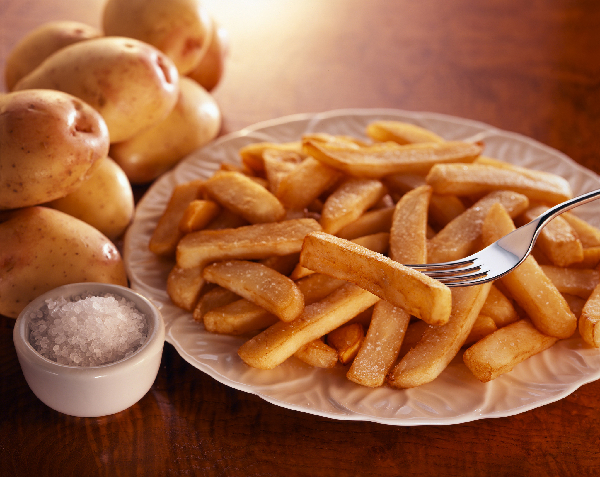 french fries, potatos and salt