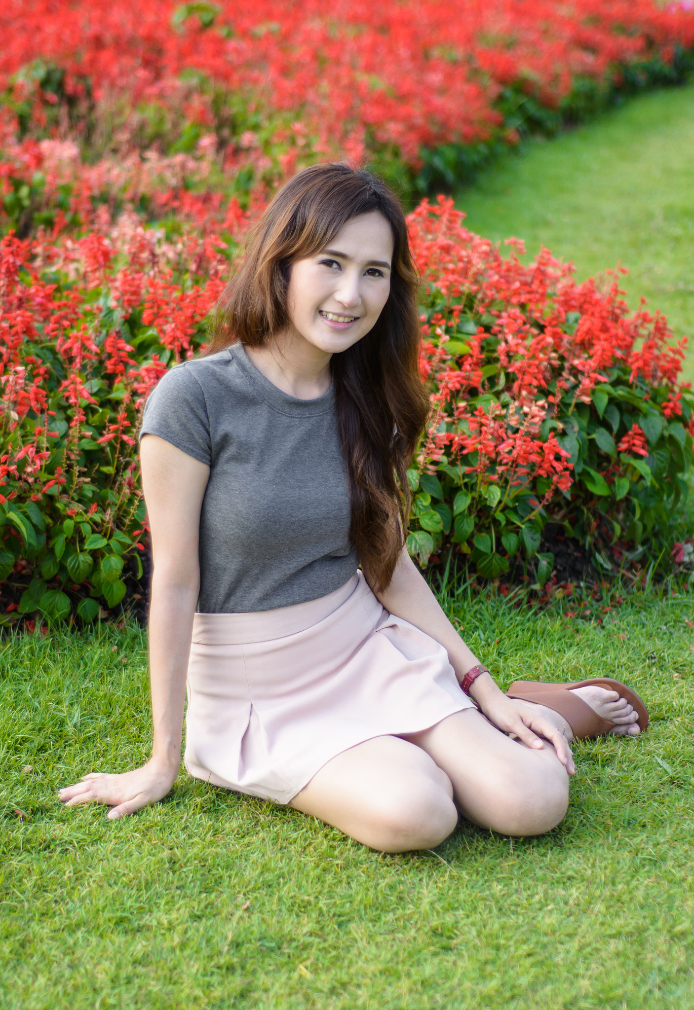 woman sitting on summer garden