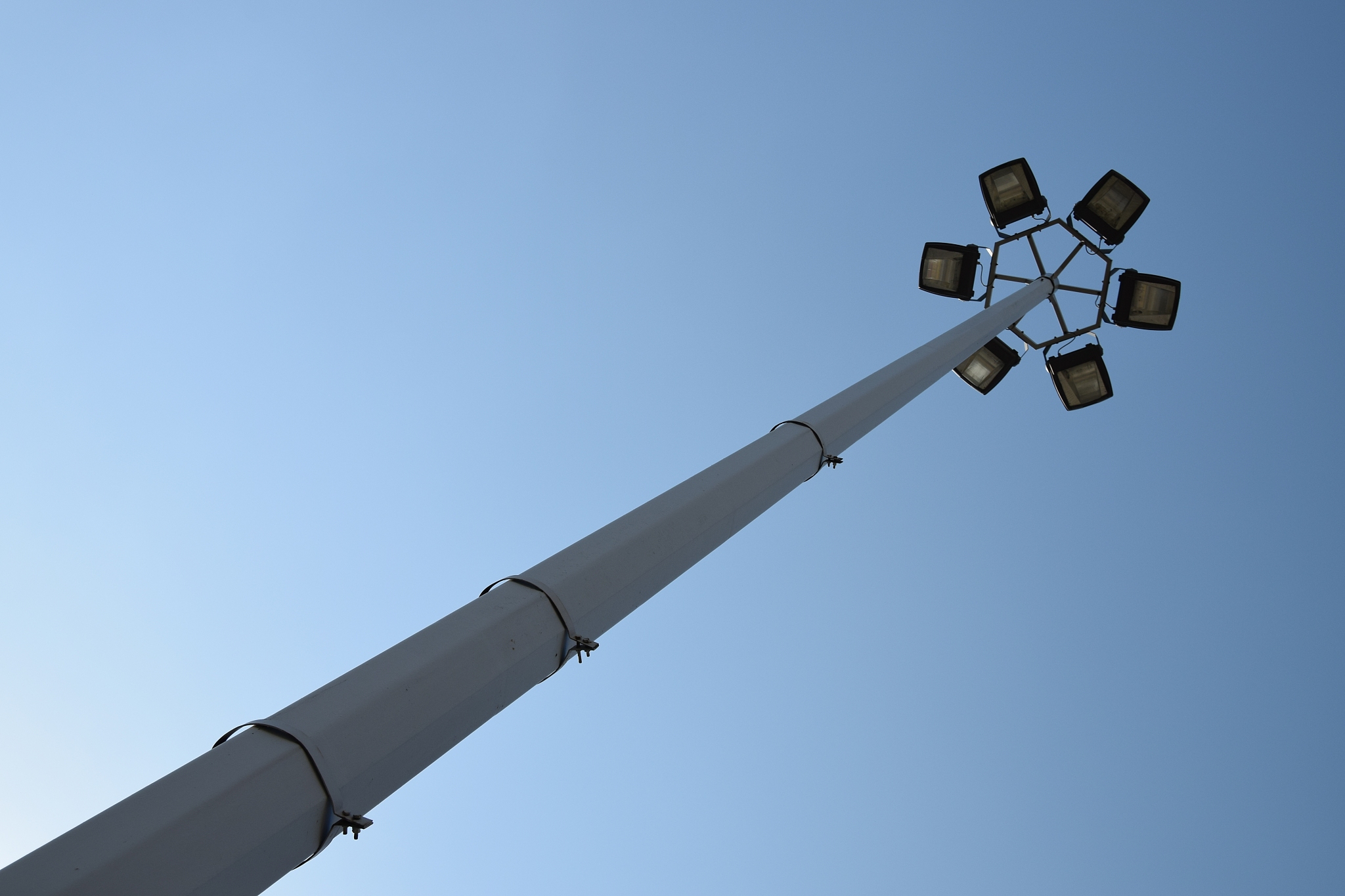 star shaped street light on the high electric pole