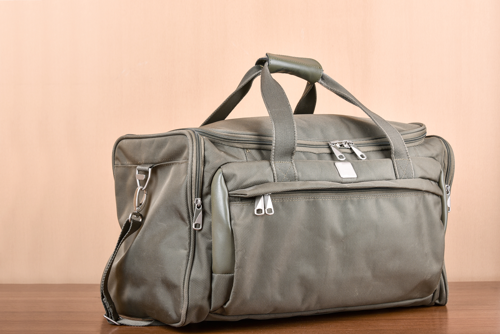 travel bag on wooden table