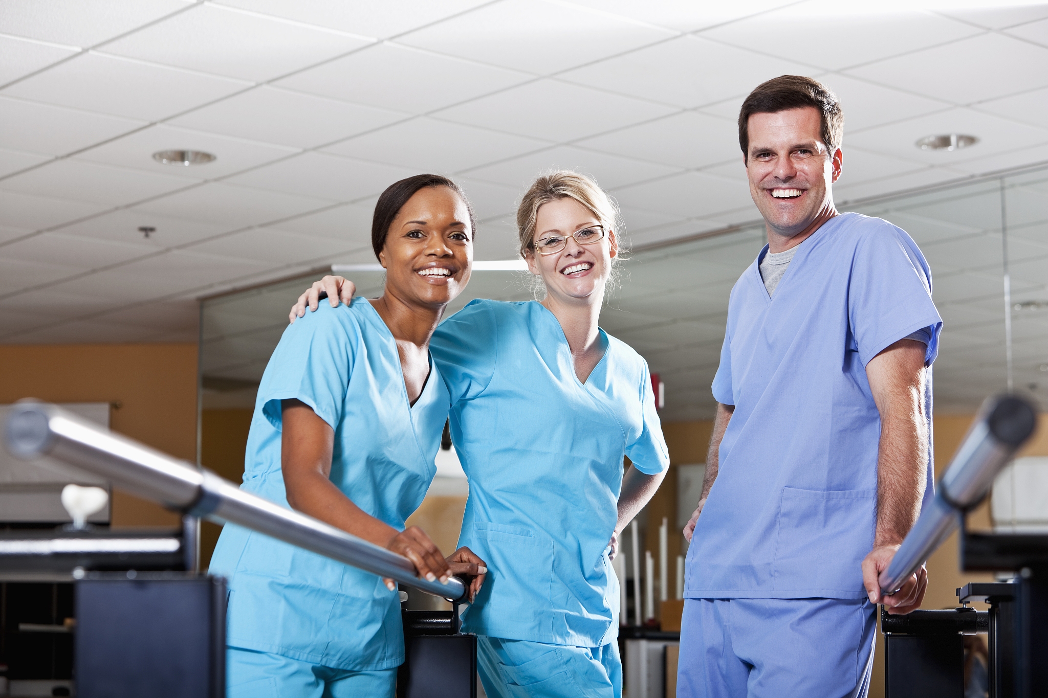 physical therapists in rehabilitation room