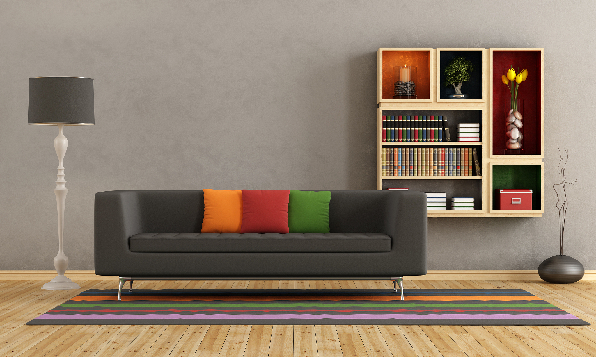 living room with colorful sofa and bookcase