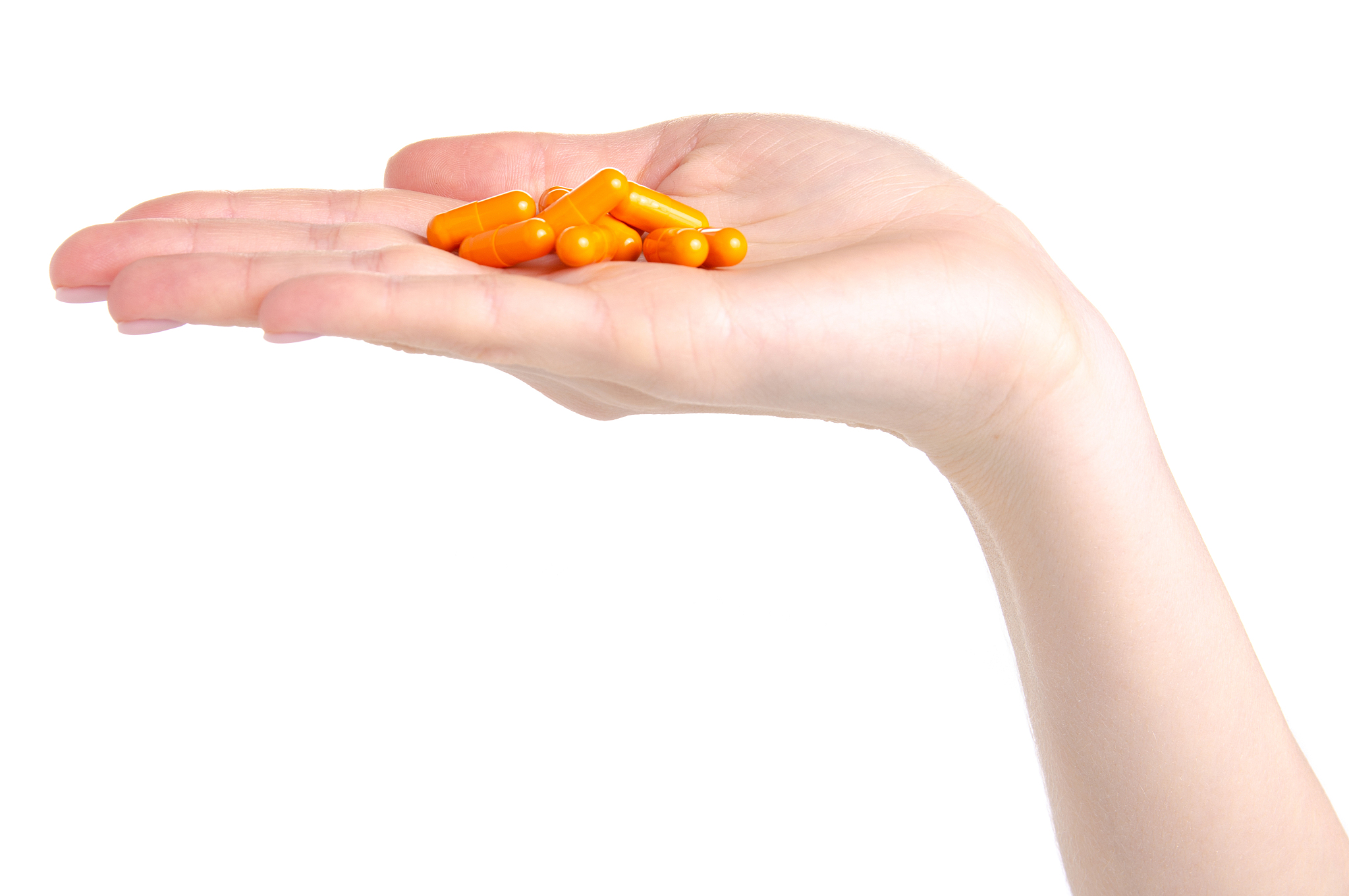 pills capsules in hand medicine health