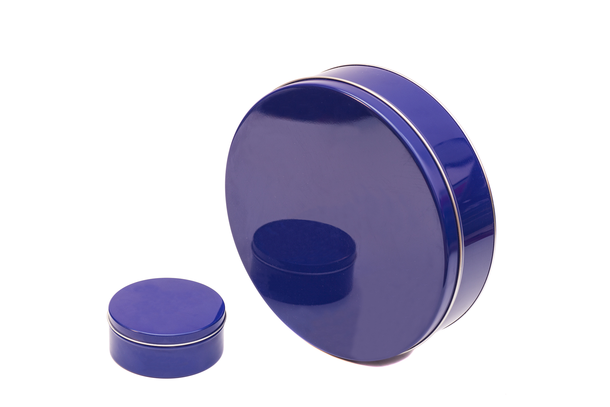 blue round metal boxes on a white background