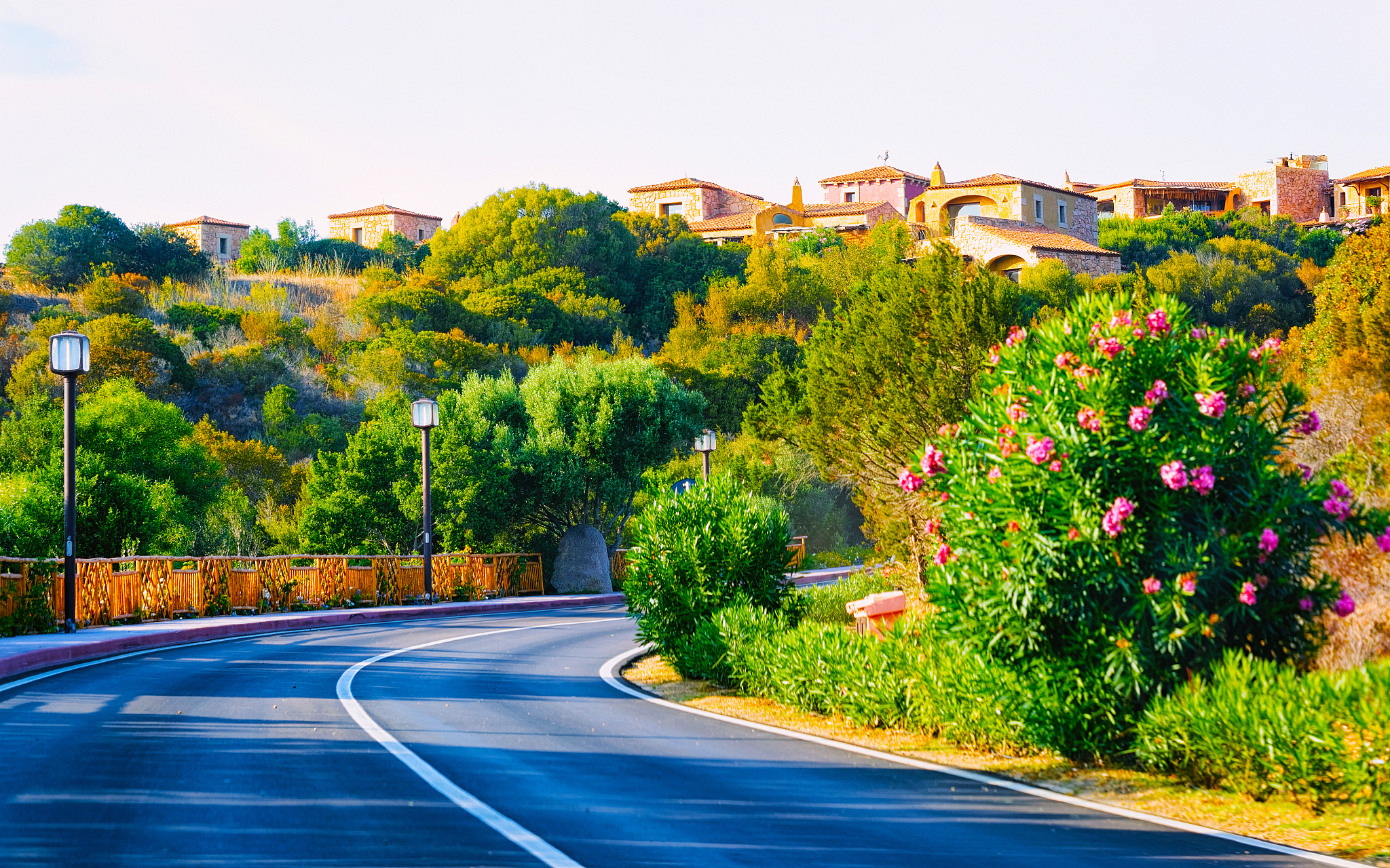 empty road without cars in porto cervo reflex