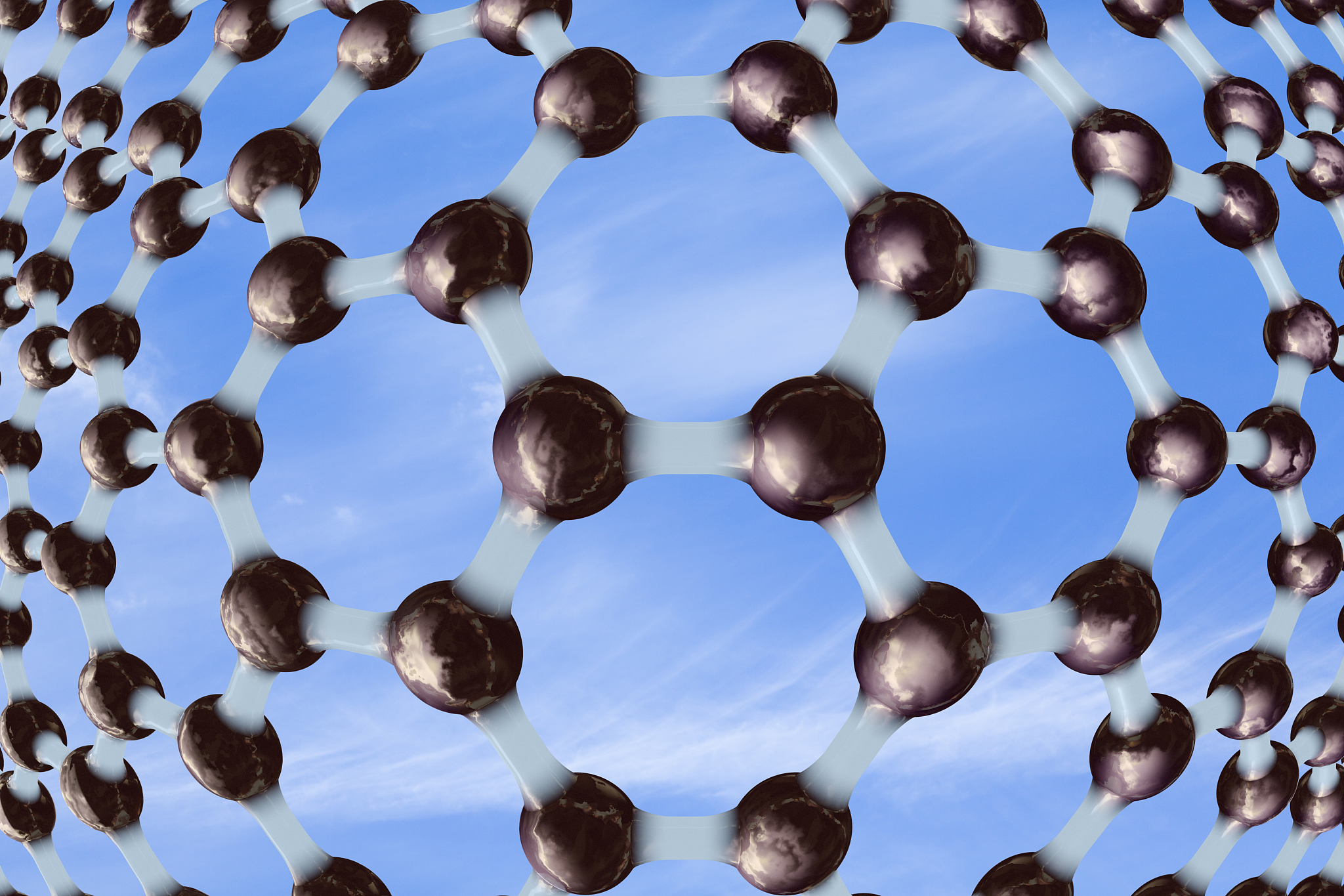 将下面这段话进行英译汉：The graphene small blocks composed of multiple layers of graphene sheets serve as reinforcing agents that are randomly and uniformly dispersed within the matrix material The graphene conte