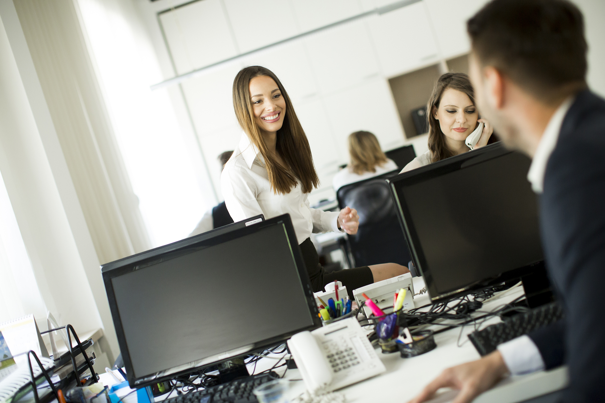 business partners working in modern office