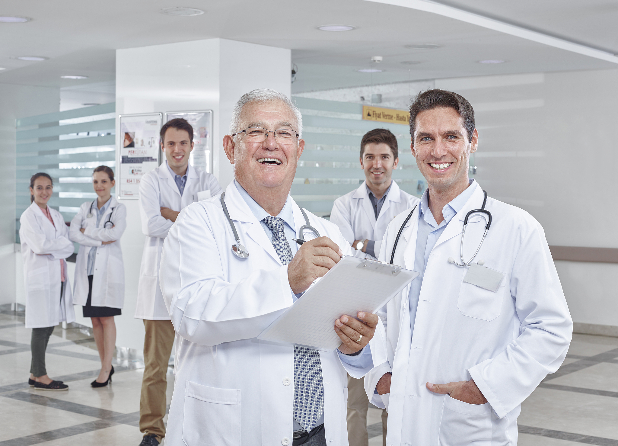 group of doctors in hospital corridor
