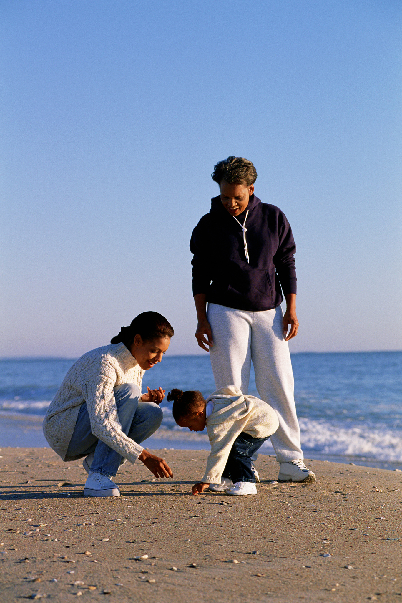 generations of women on beach