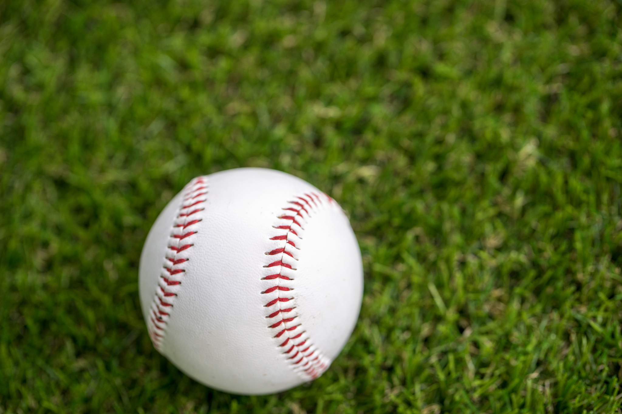 tennis balls and green grass.