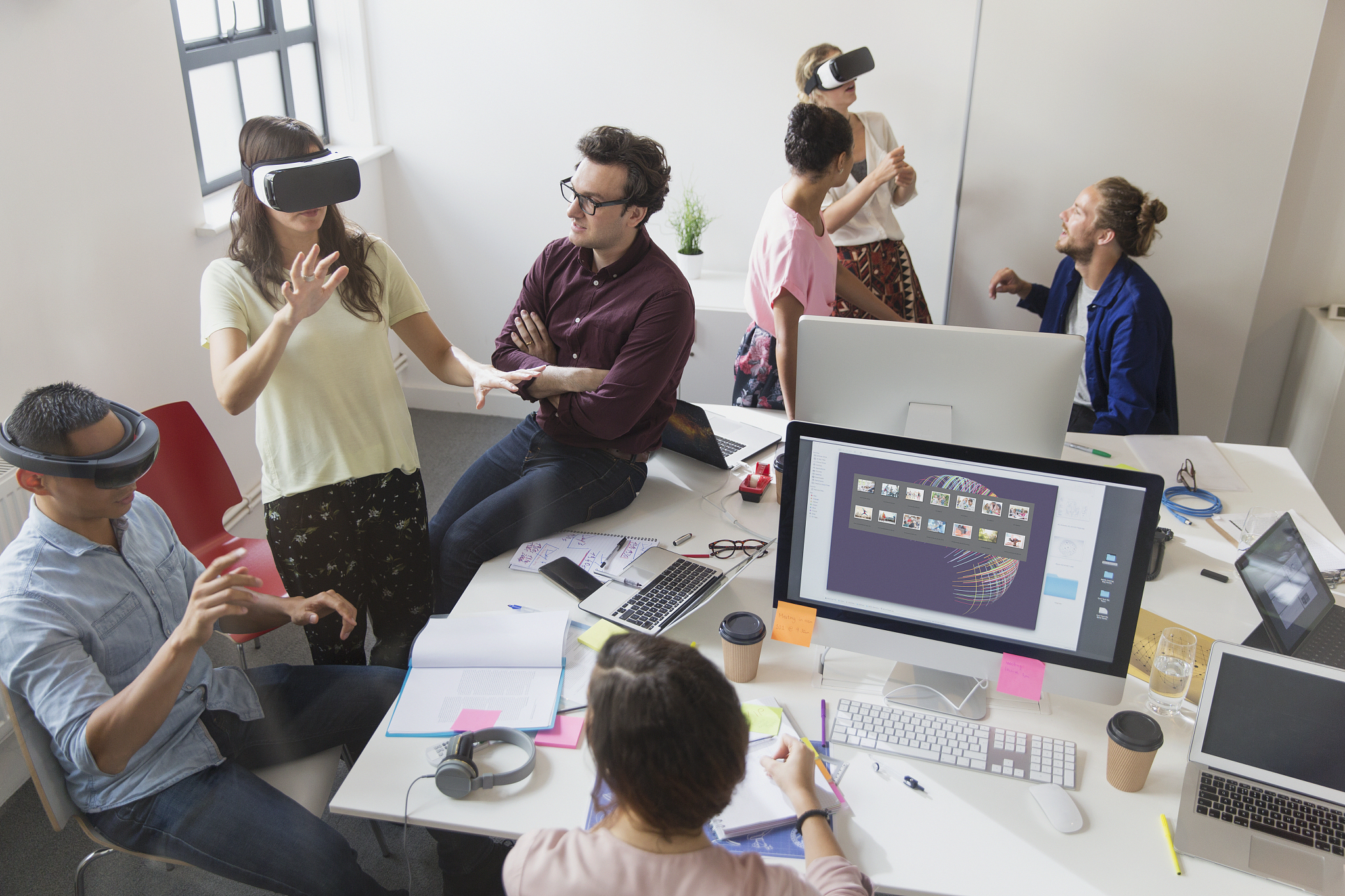 computer programmers testing virtual reality simulator glasses i