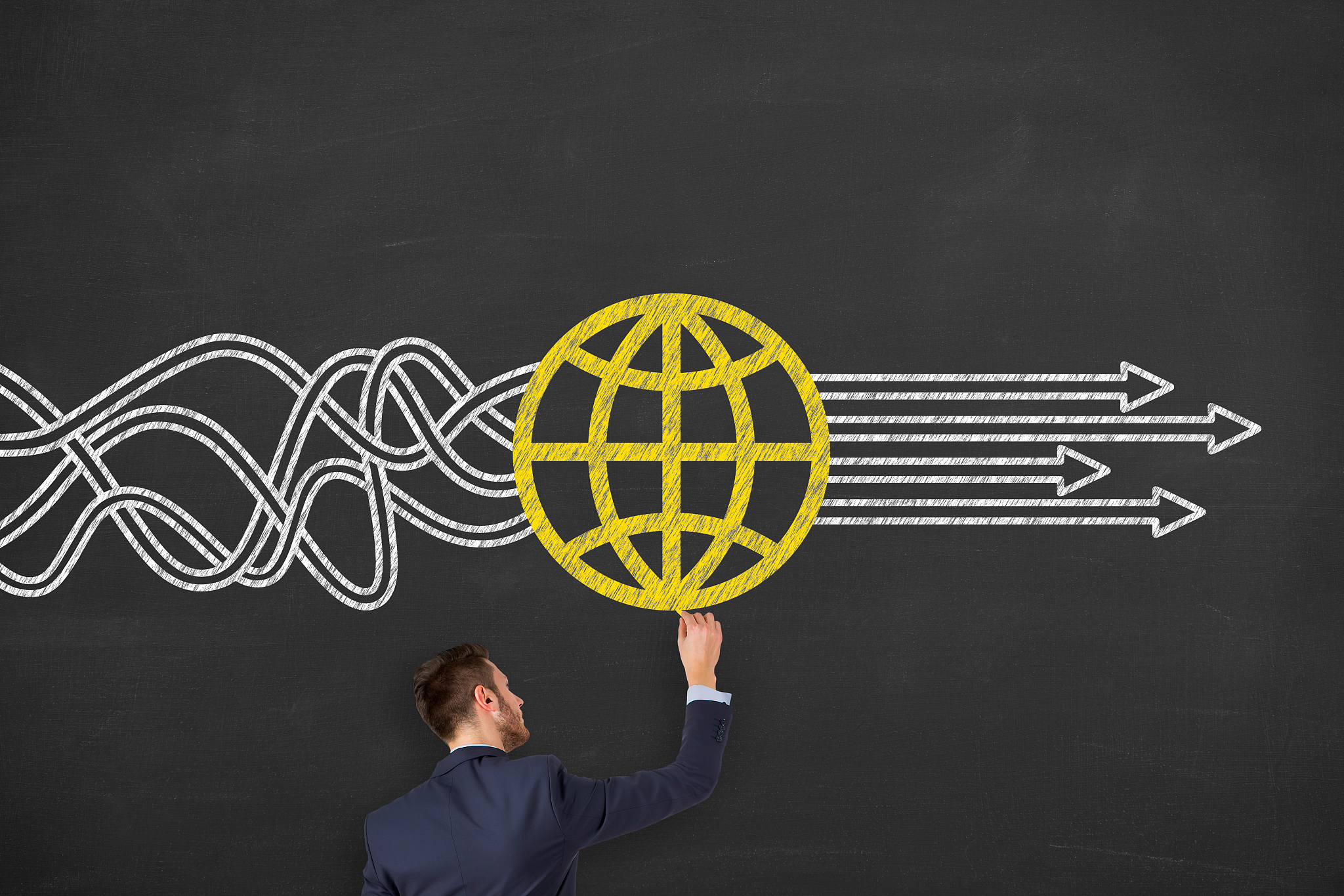 global business solution concepts on blackboard background