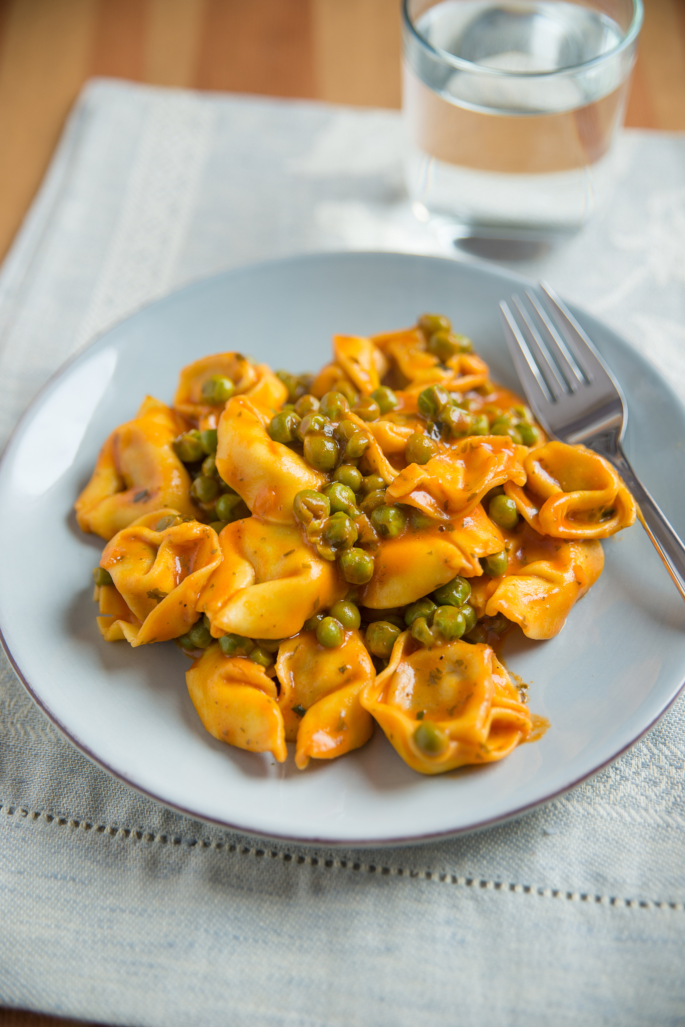 tortellini with tomato pea sauce