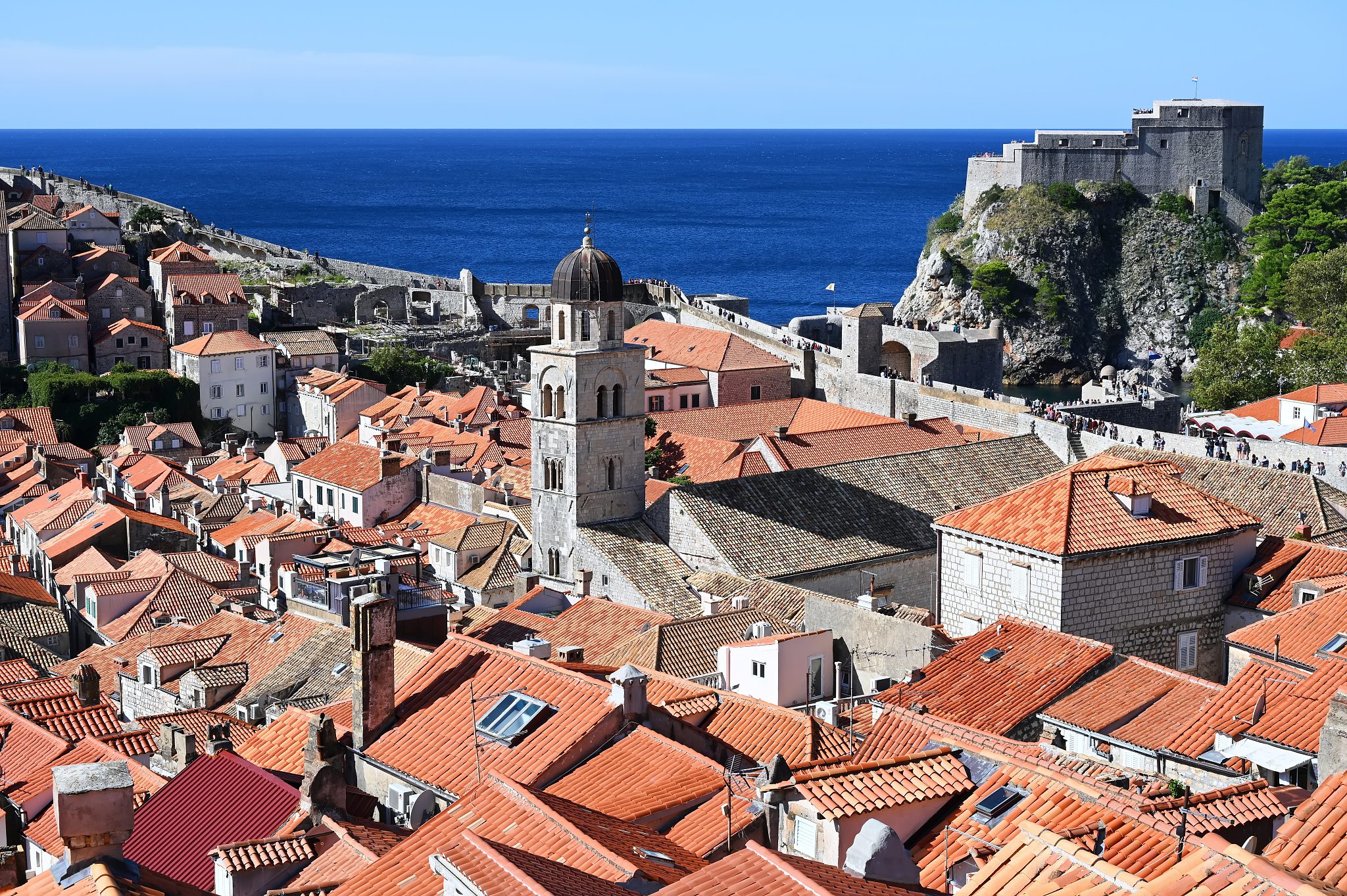 high angle view of dubrovnik rooftops with historical fort lovri