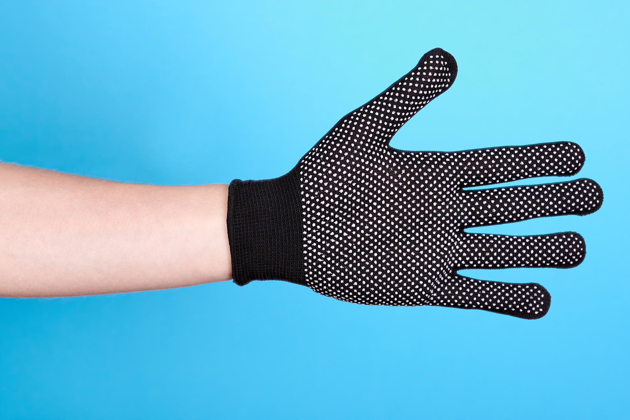 hand in working glove, handshake gesture. isolated on blue backg