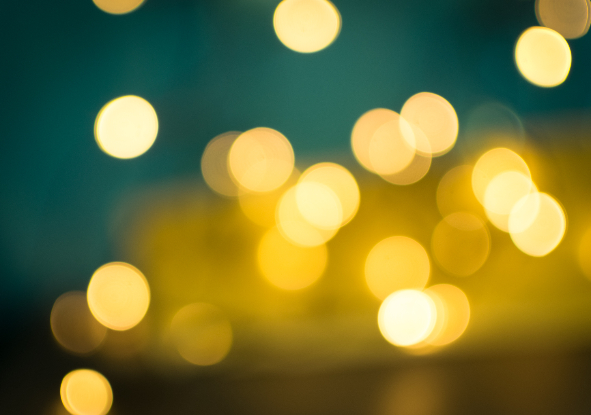 abstract yellow bokeh circles on blurred background