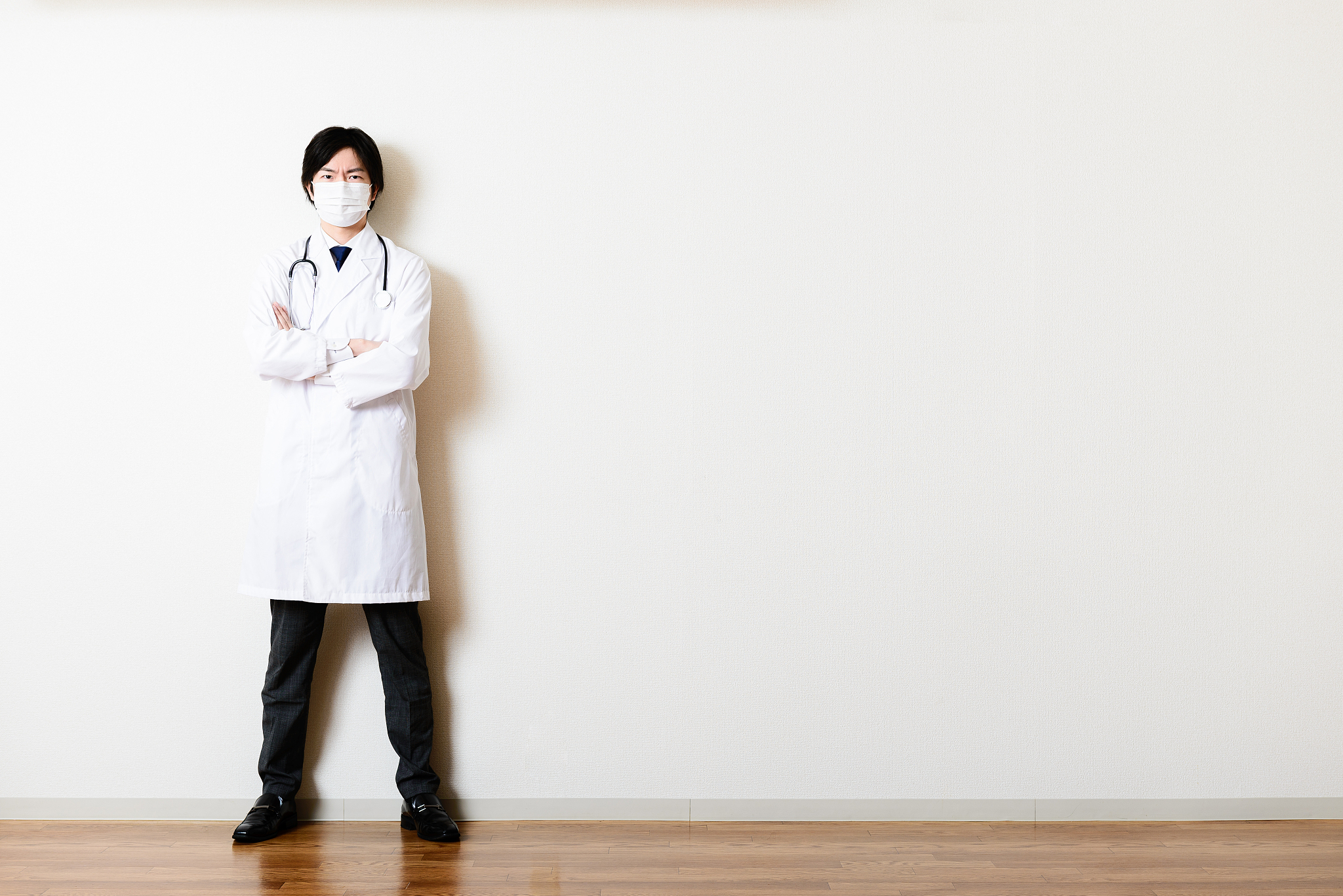asian doctor in room