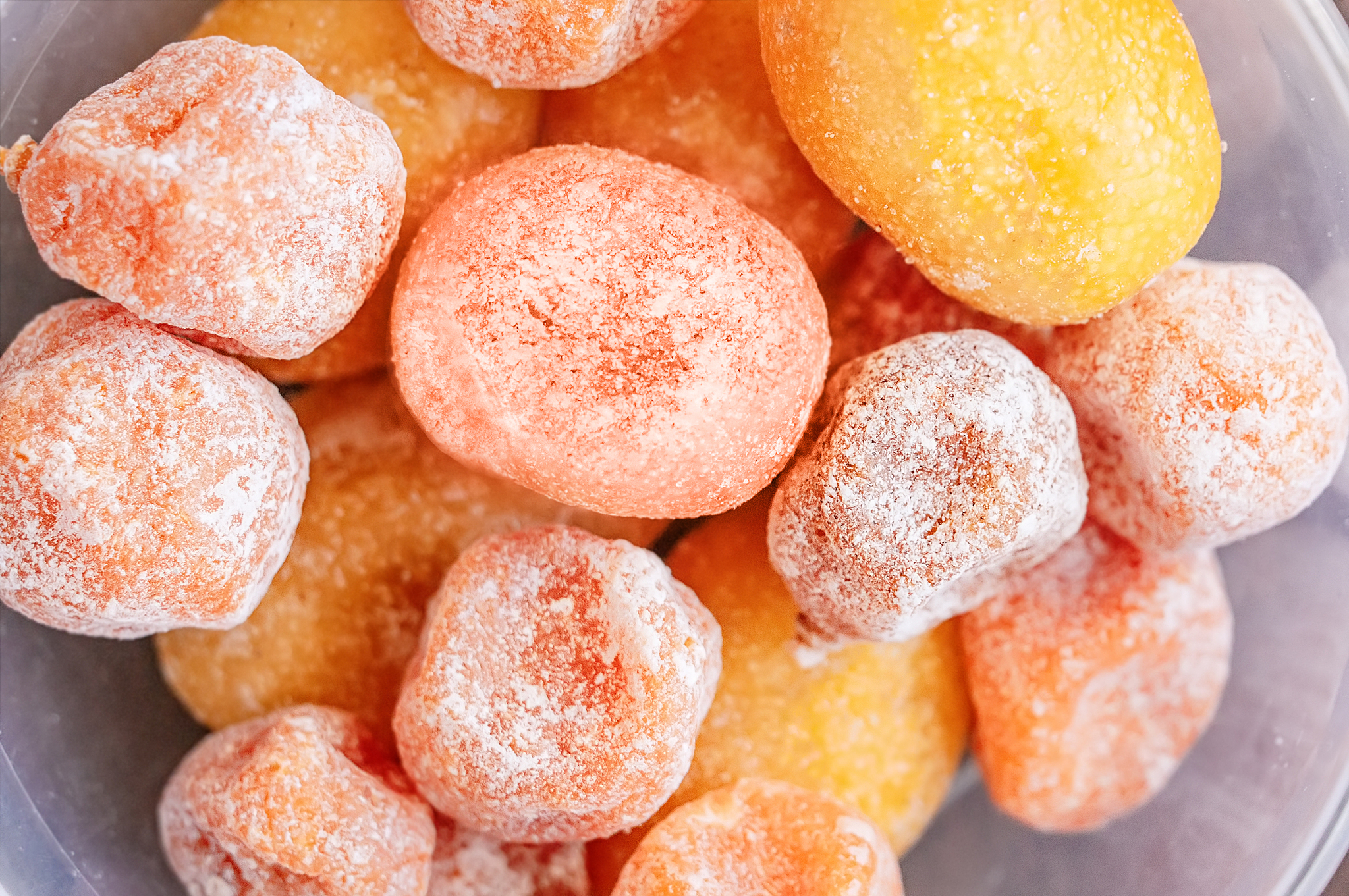 dried sugar yellow dried kumquat. background. top view.