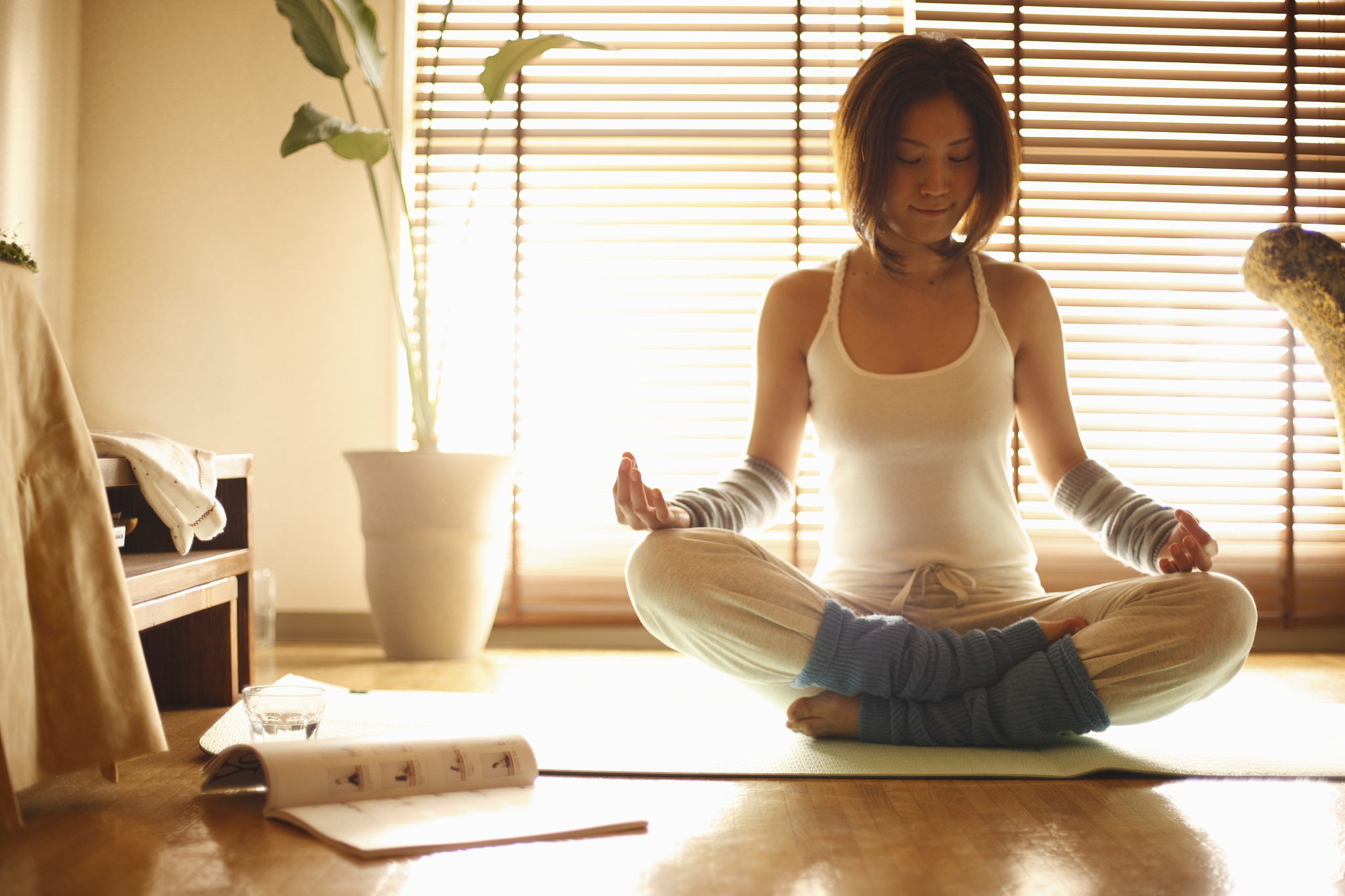 a woman doing yoga