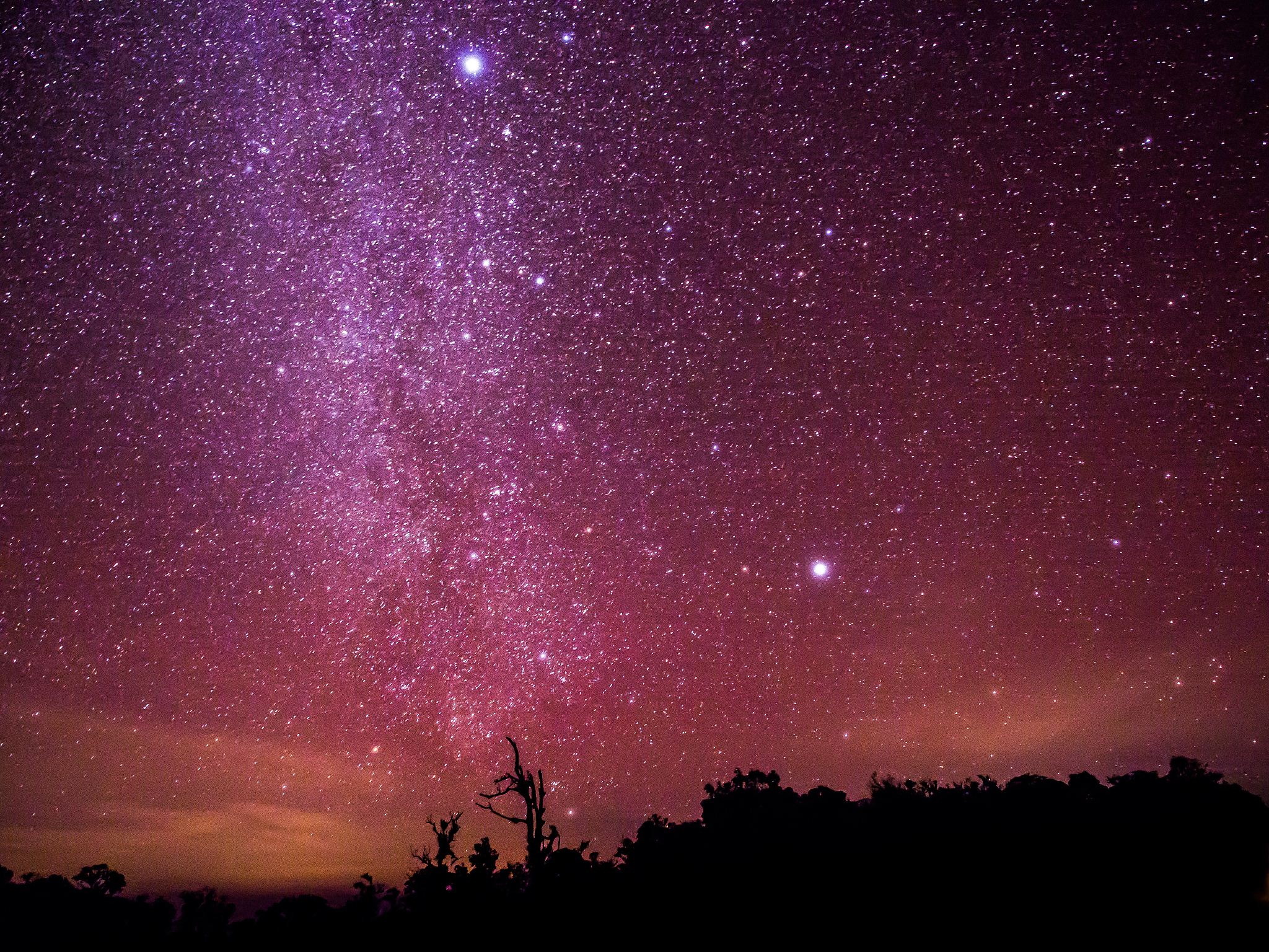 the colorful sky with clusters of stars and milkyway galaxy abov