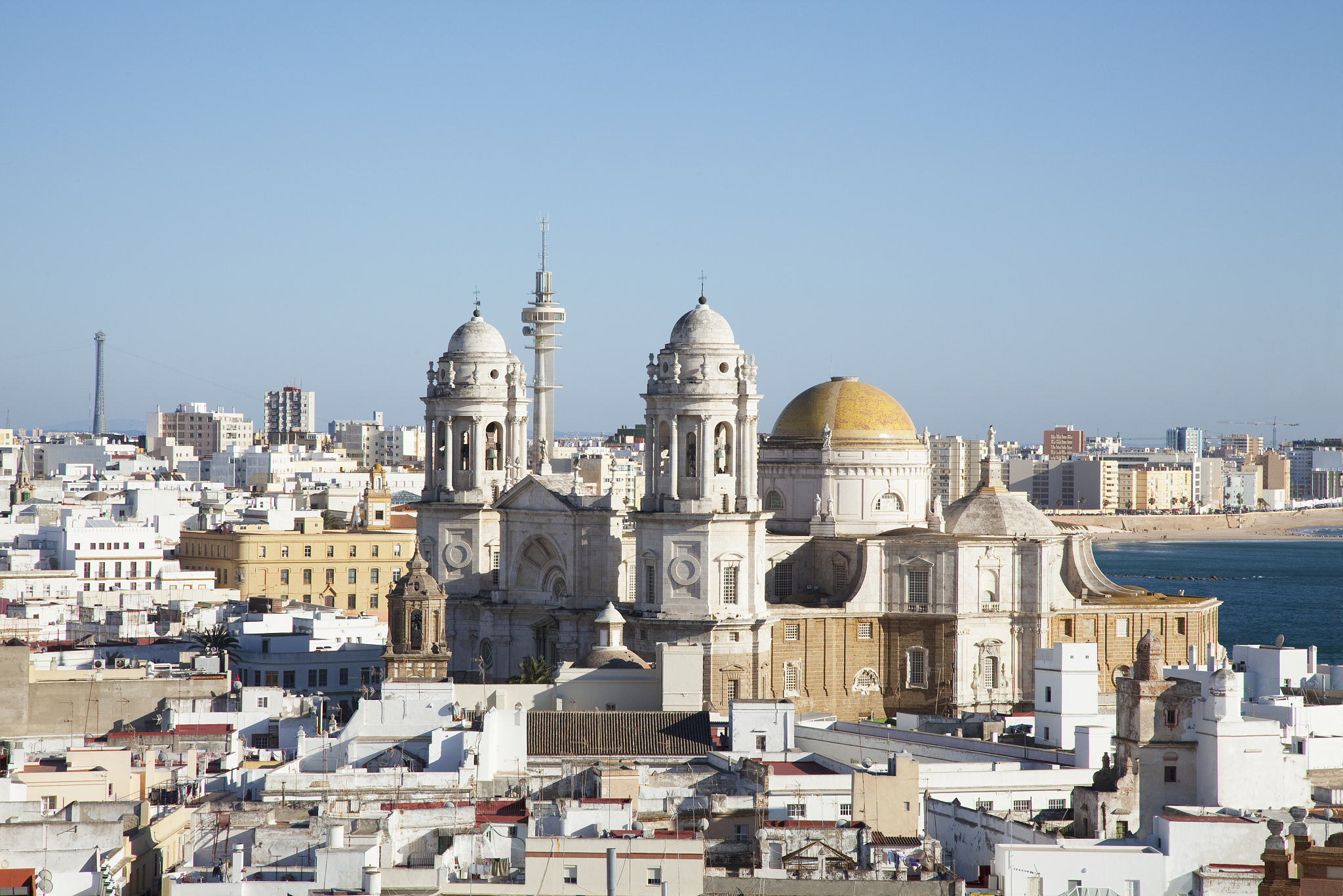whitewashed town along the coast and cadiz cathedral