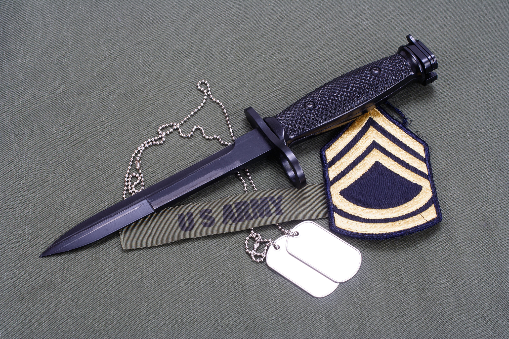 bayonet on us army uniform background