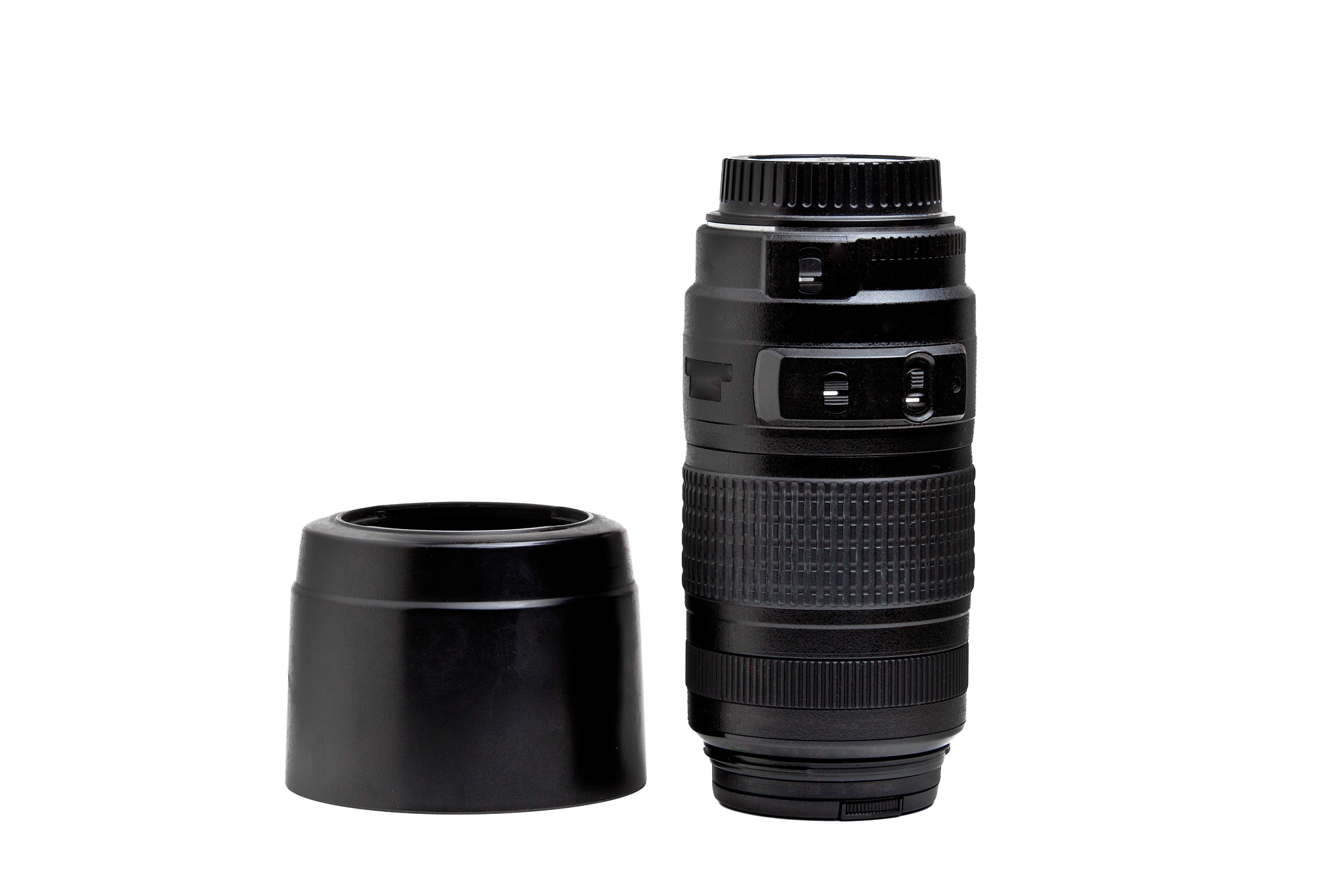 zoom lens with a lens hood for the camera on a white background
